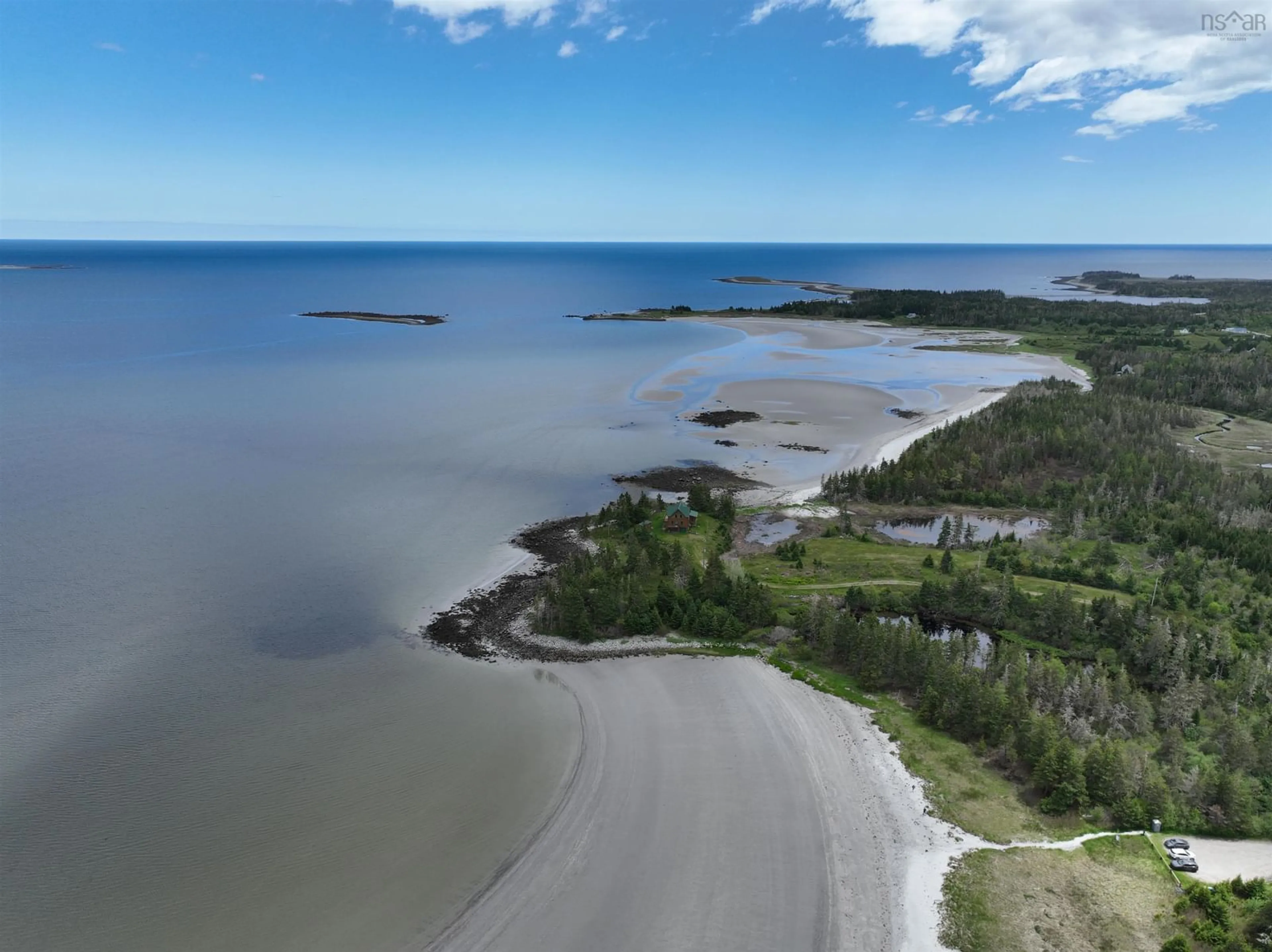 A pic from outside/outdoor area/front of a property/back of a property/a pic from drone, water/lake/river/ocean view for 2450 West Sable Rd, Little Harbour Nova Scotia B0T 1V0