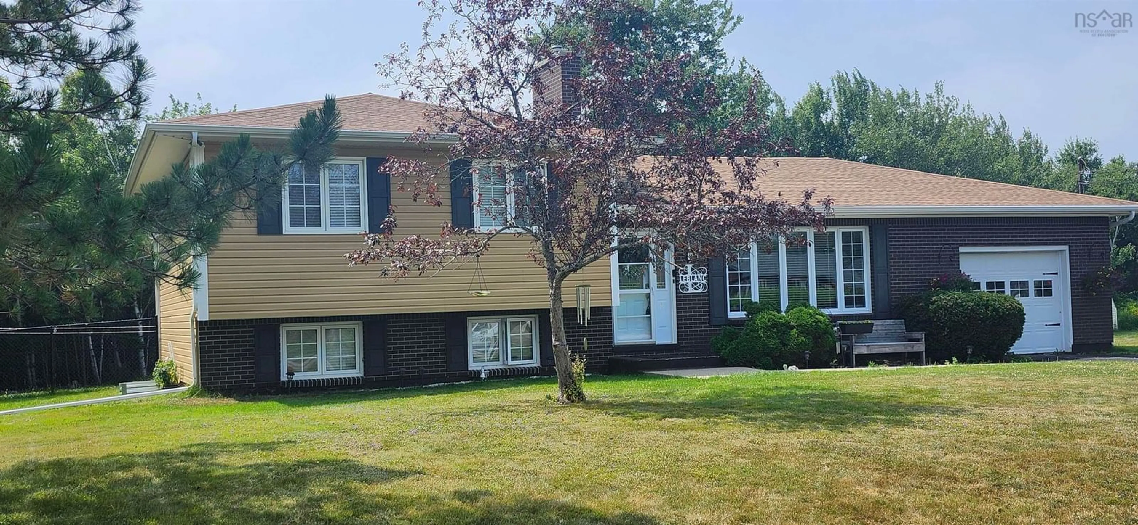 Home with vinyl exterior material, street for 13 Lupin Lane, Tanglewood Nova Scotia B1M 1A6