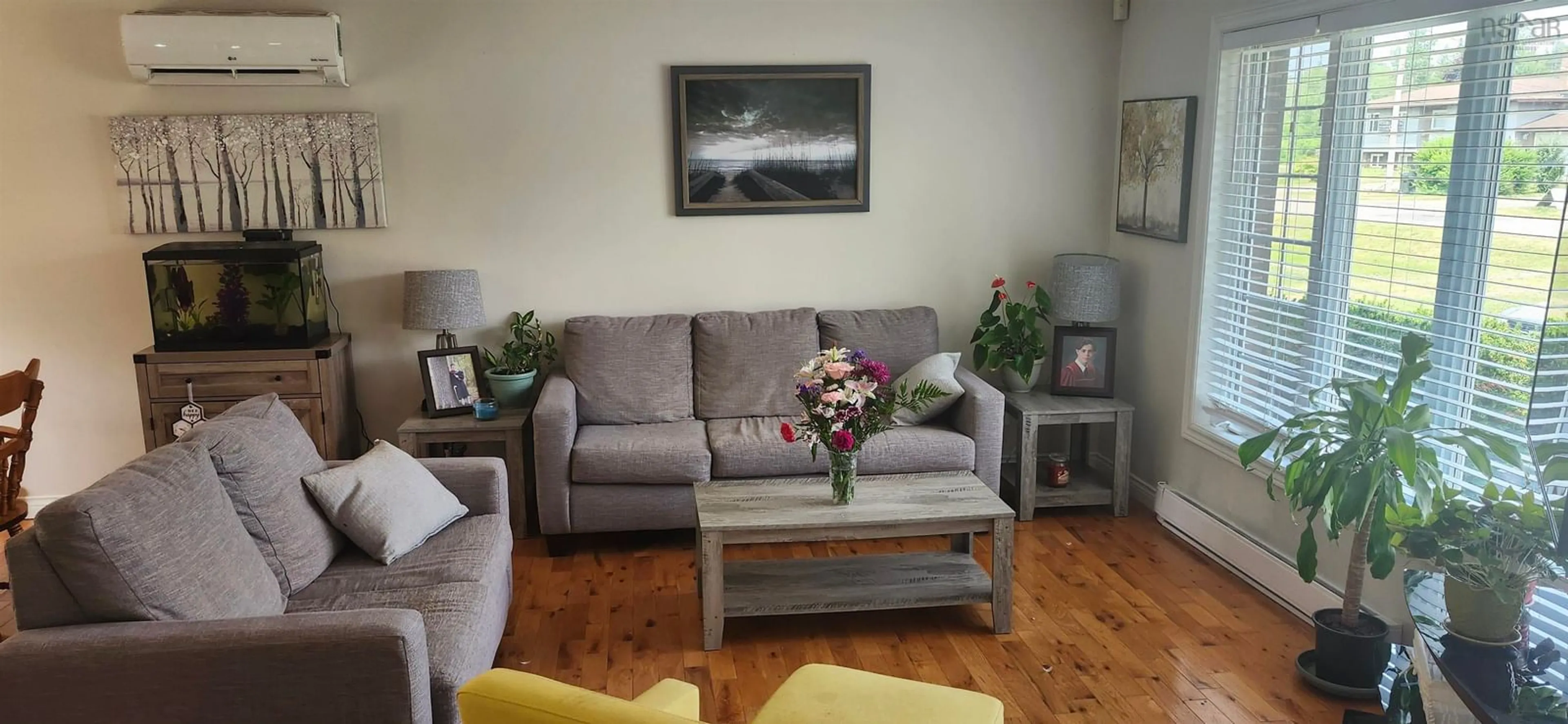 Living room with furniture, wood/laminate floor for 13 Lupin Lane, Tanglewood Nova Scotia B1M 1A6
