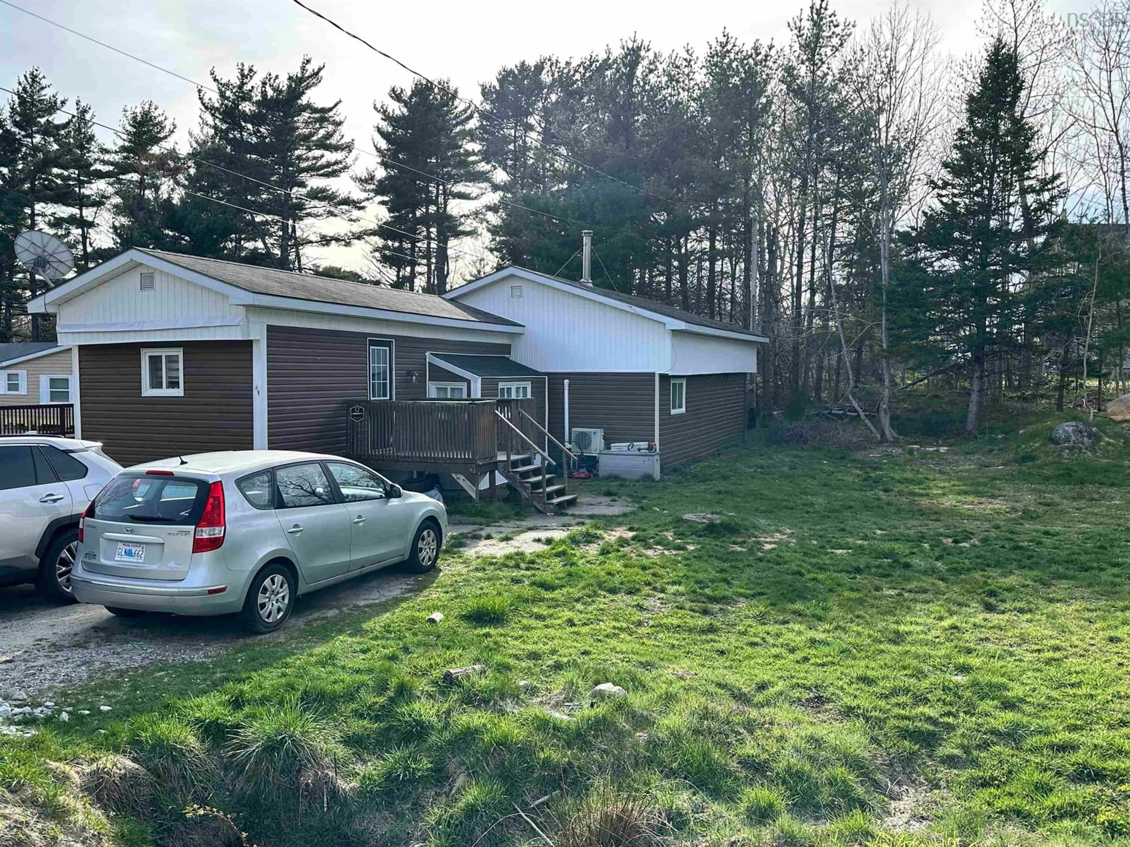 A pic from outside/outdoor area/front of a property/back of a property/a pic from drone, unknown for 41 School St, Sandy Point Nova Scotia B0T 1W0