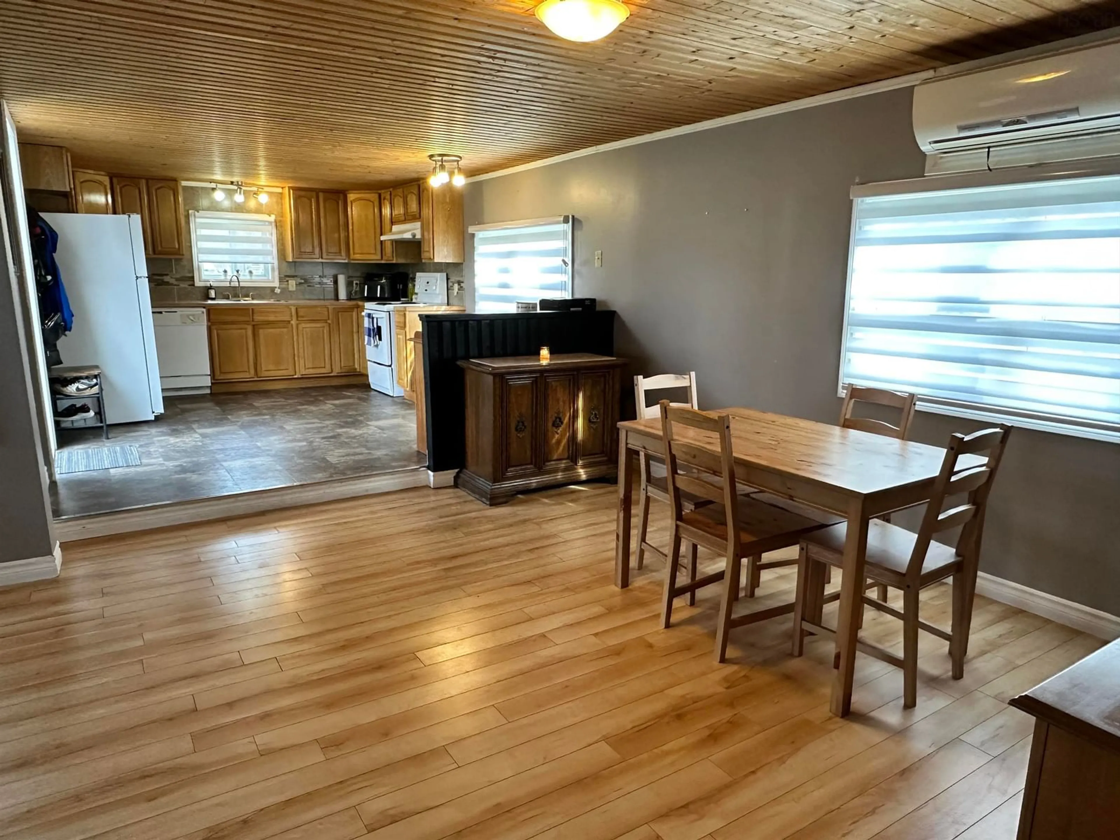 Open concept kitchen, wood/laminate floor for 41 School St, Sandy Point Nova Scotia B0T 1W0