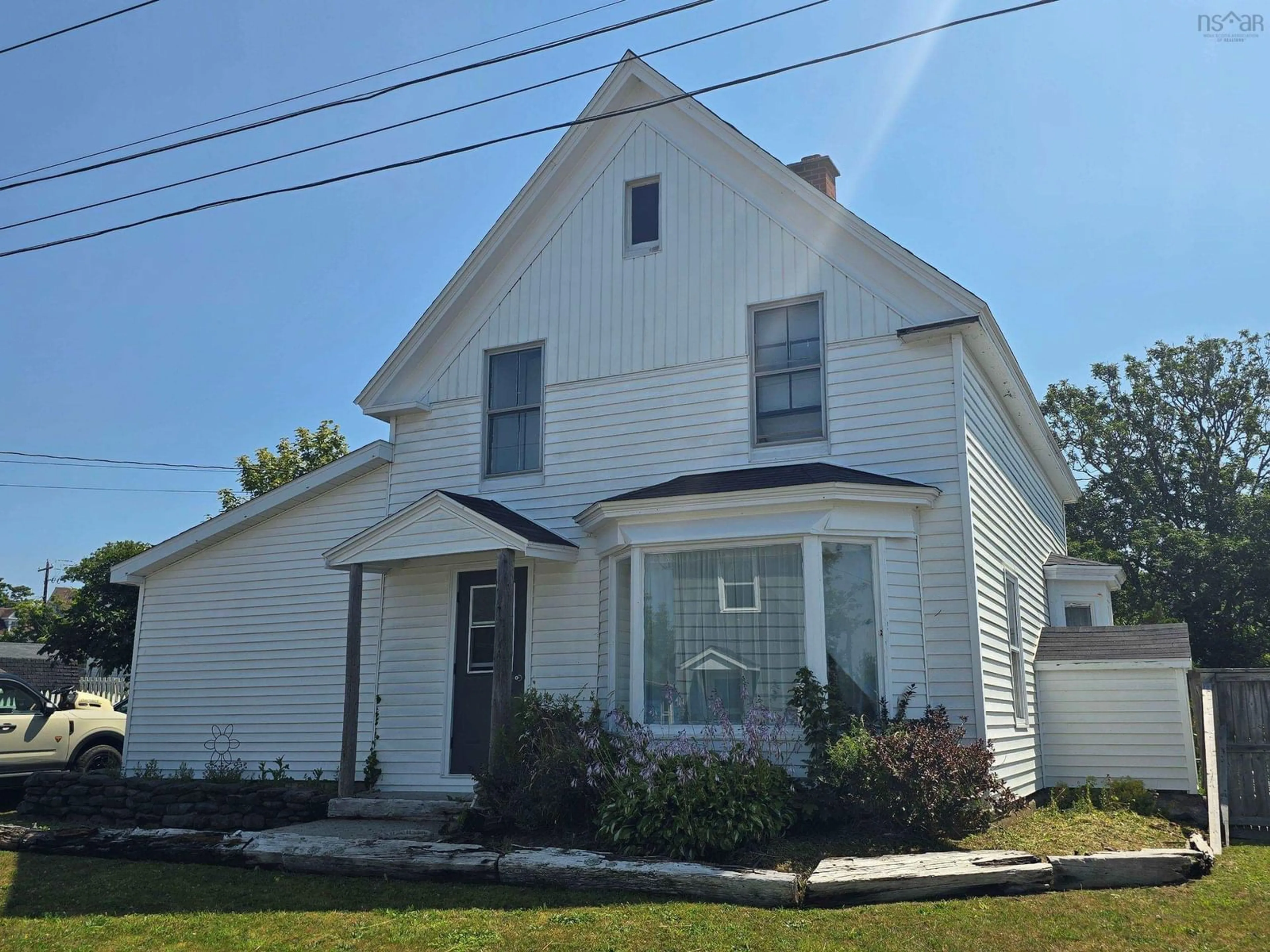 Home with vinyl exterior material, building for 21 Charles St, Port Maitland Nova Scotia B5A 5R8