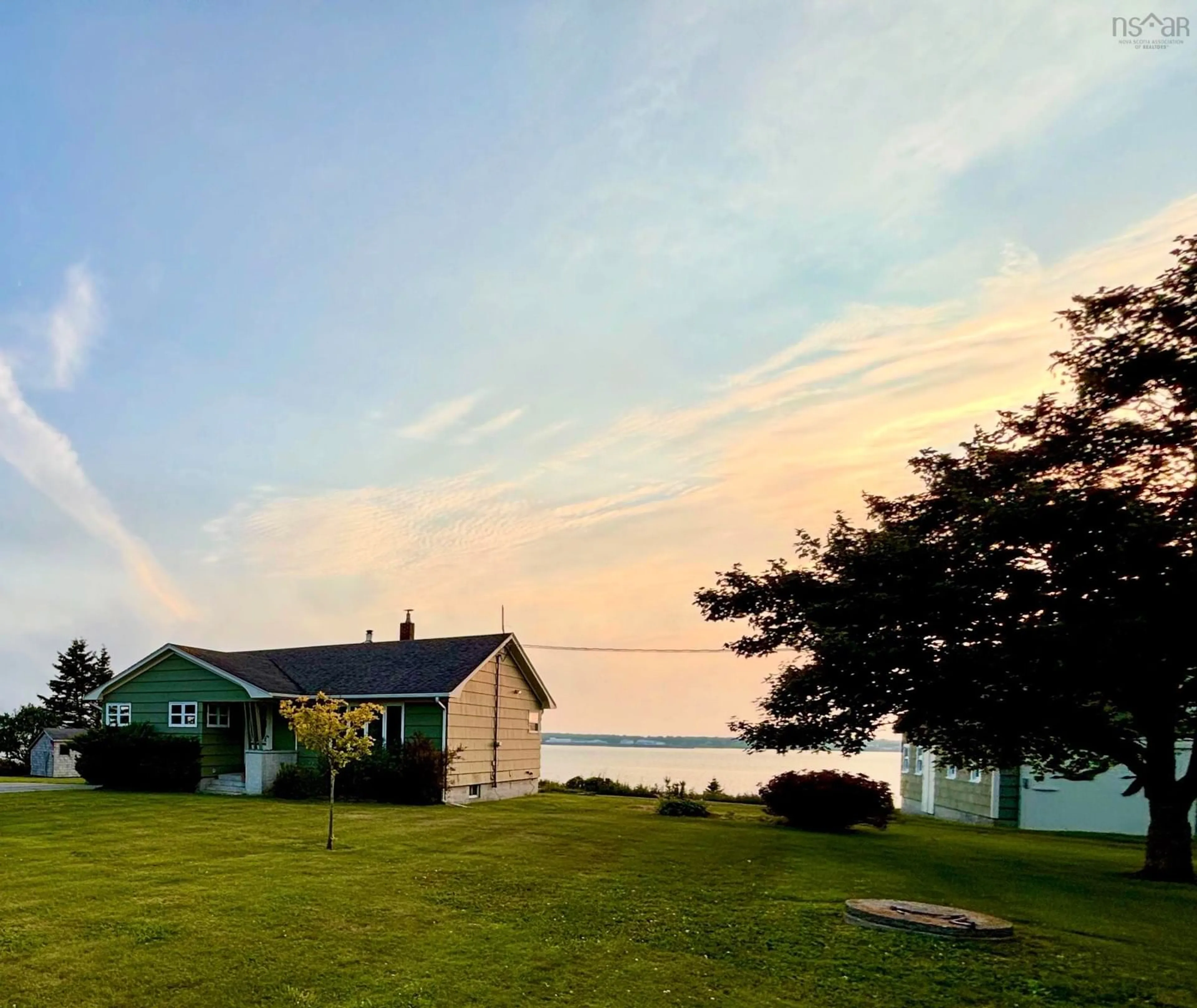 A pic from outside/outdoor area/front of a property/back of a property/a pic from drone, water/lake/river/ocean view for 639 Highway 3 Hwy, Lower East Pubnico Nova Scotia B0W 2A0