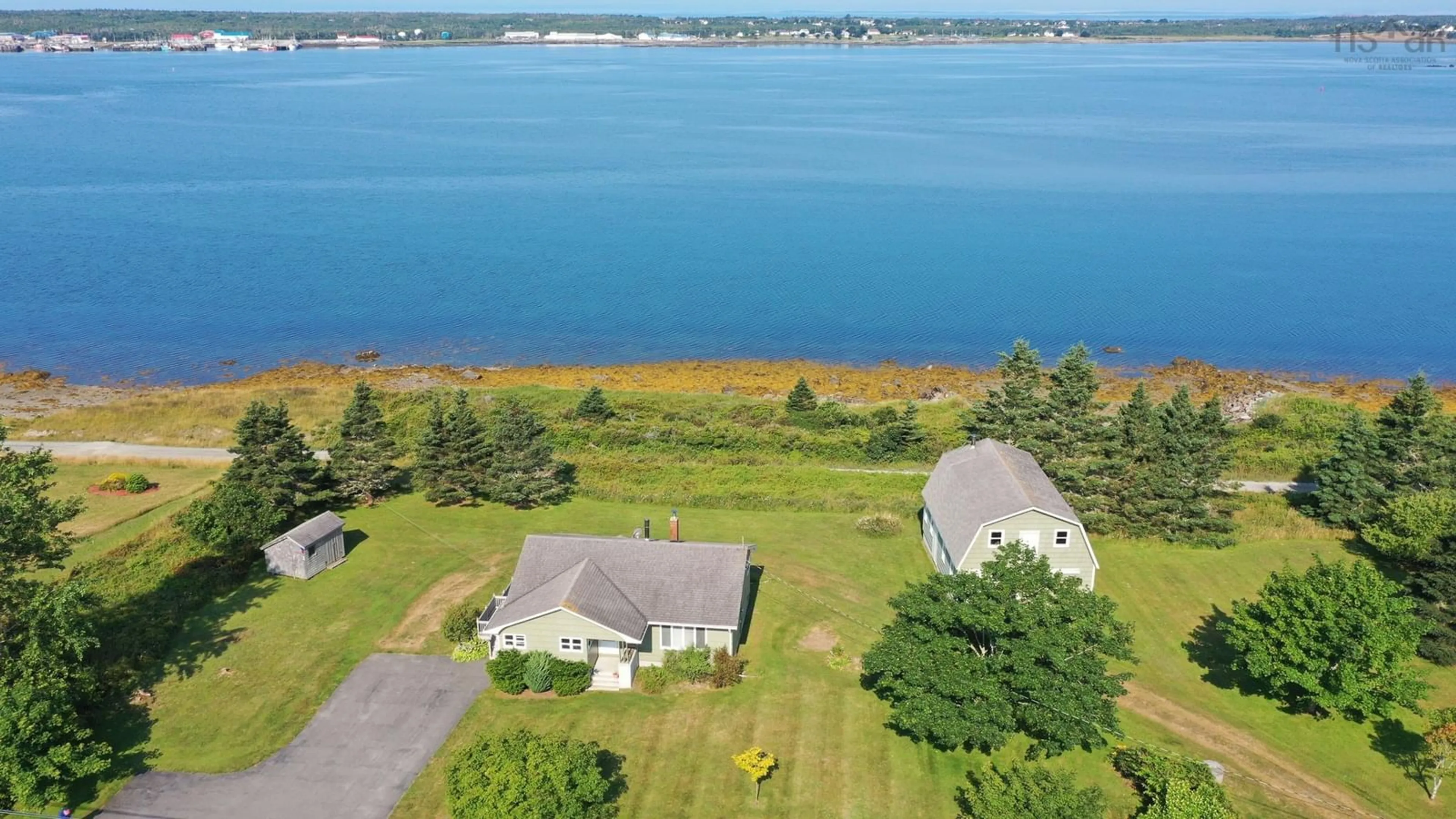 A pic from outside/outdoor area/front of a property/back of a property/a pic from drone, water/lake/river/ocean view for 639 Highway 3 Hwy, Lower East Pubnico Nova Scotia B0W 2A0