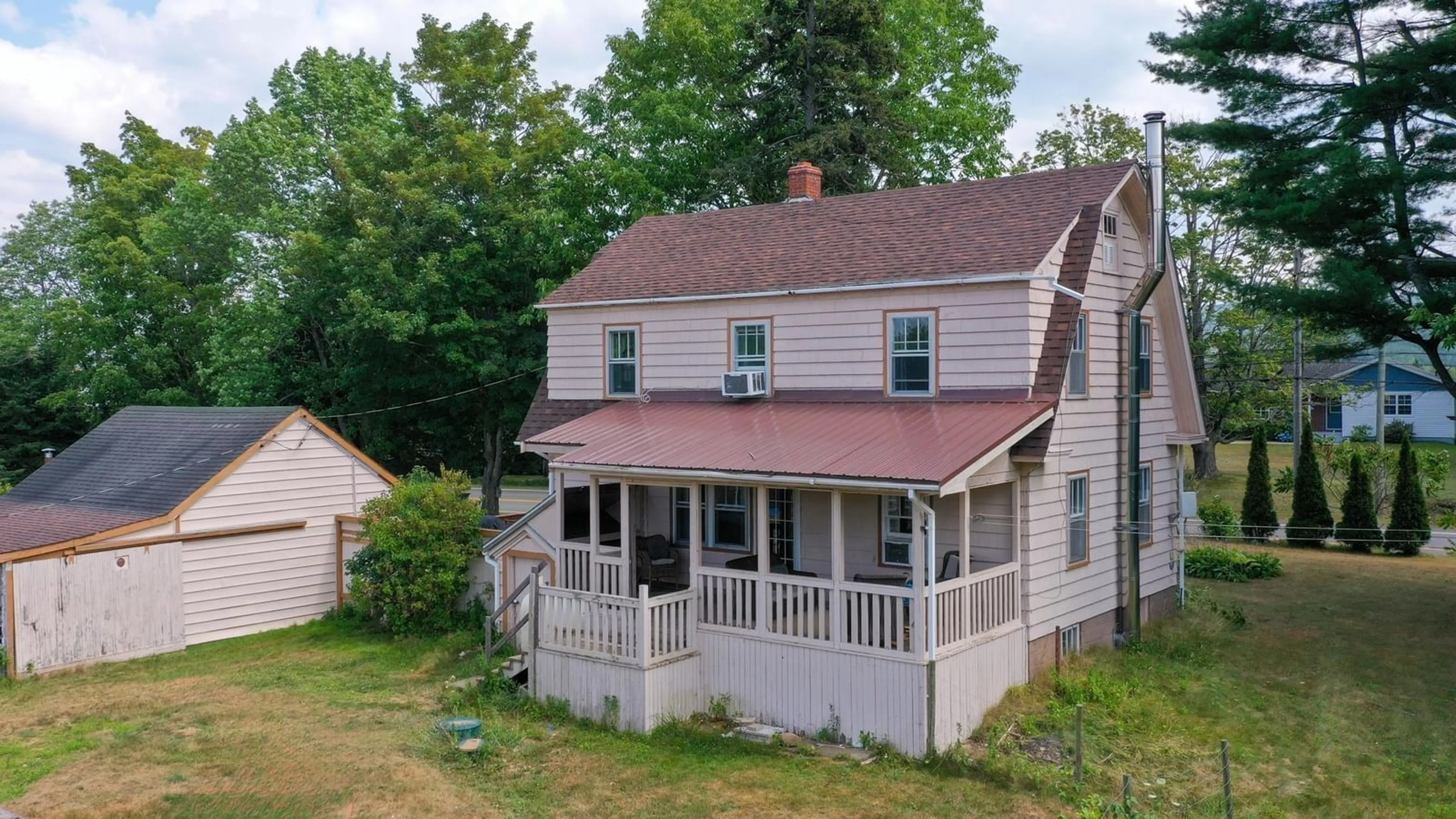 A pic from outside/outdoor area/front of a property/back of a property/a pic from drone, building for 5065 Highway 1, Waterville Nova Scotia B0P 1V0