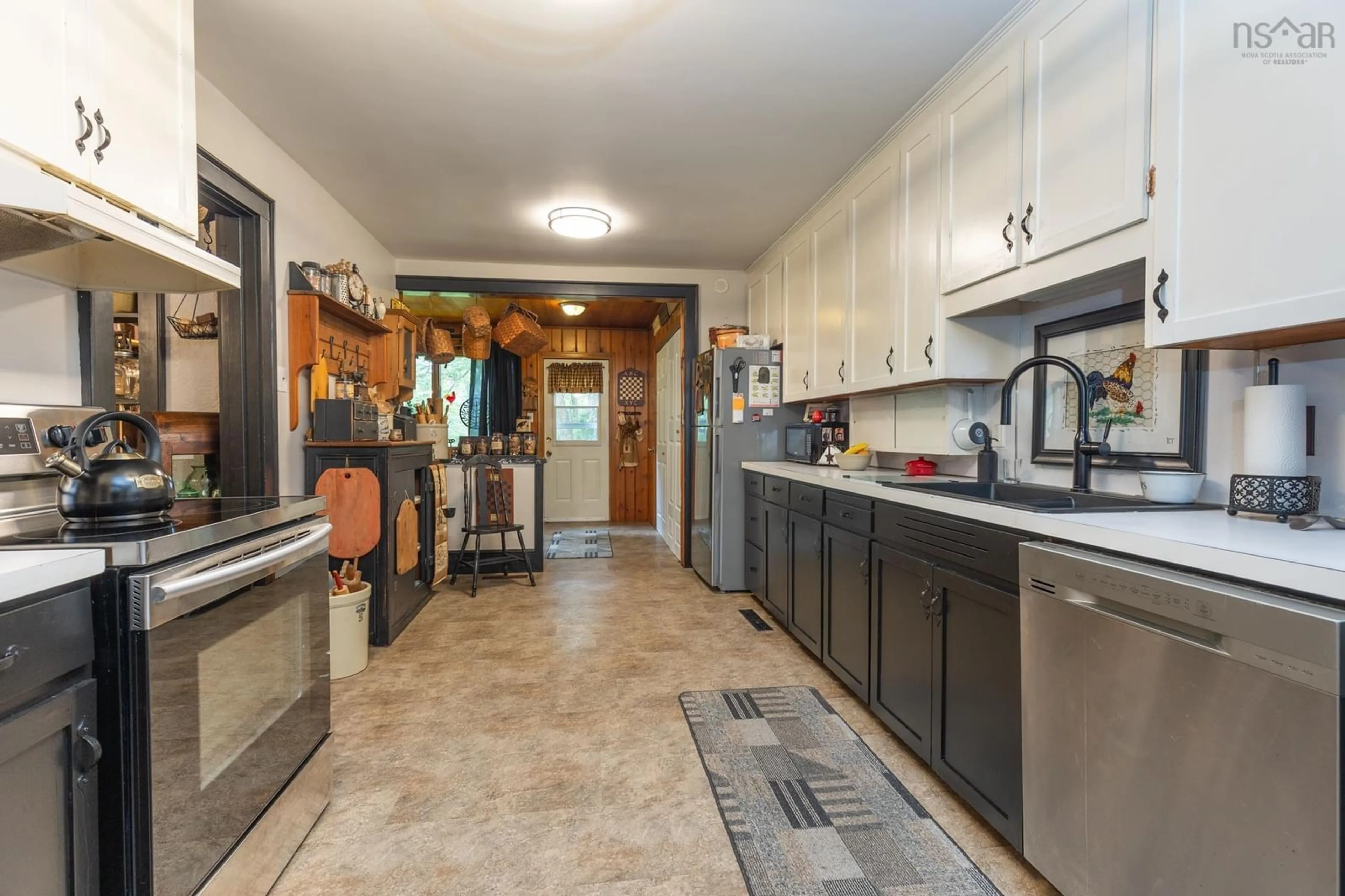 Open concept kitchen, ceramic/tile floor for 11 Highland Ave, Yarmouth Nova Scotia B5A 2A3
