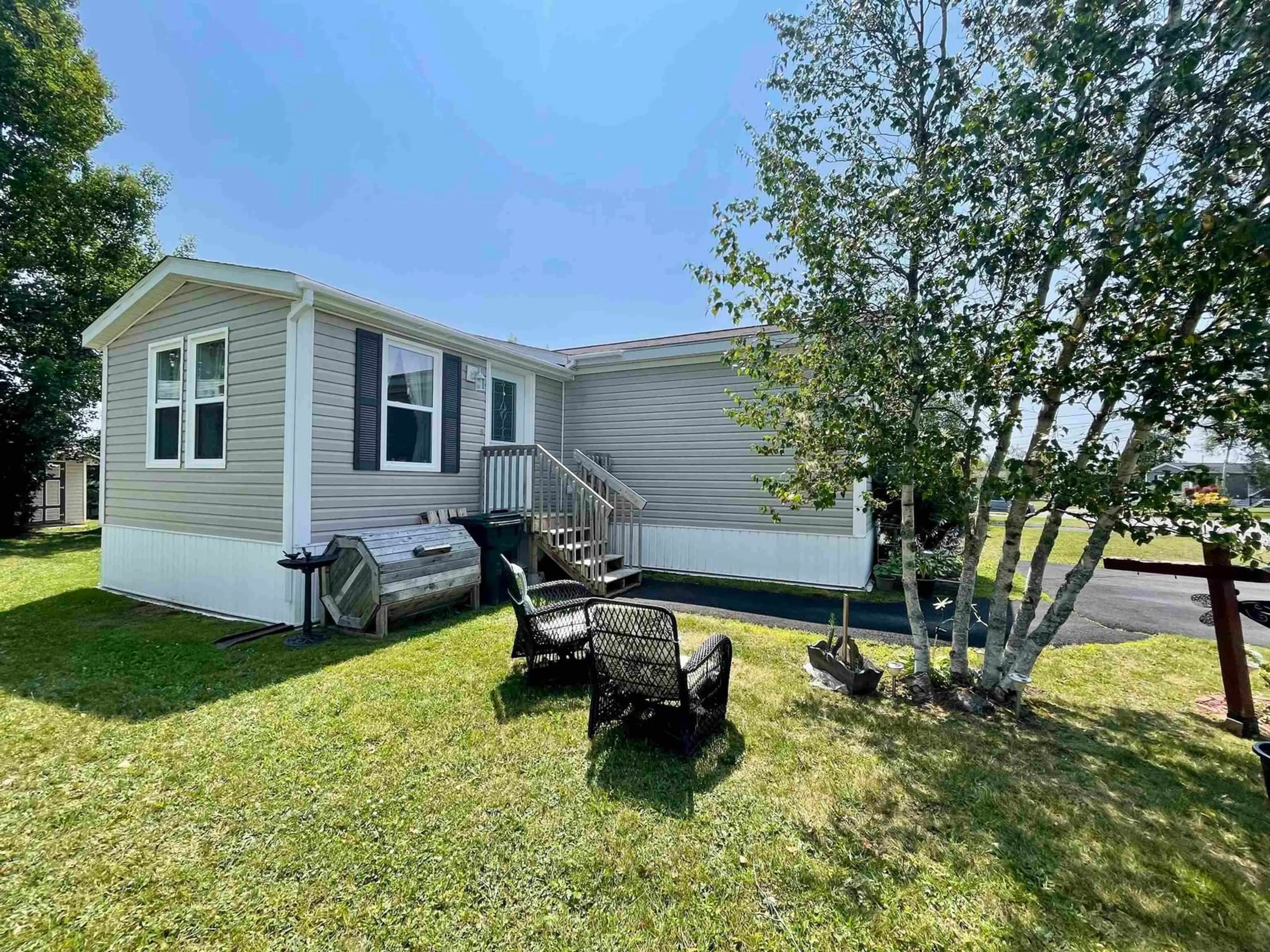 A pic from outside/outdoor area/front of a property/back of a property/a pic from drone, water/lake/river/ocean view for 33 Pinehurst St, Amherst Nova Scotia B4H 4X5