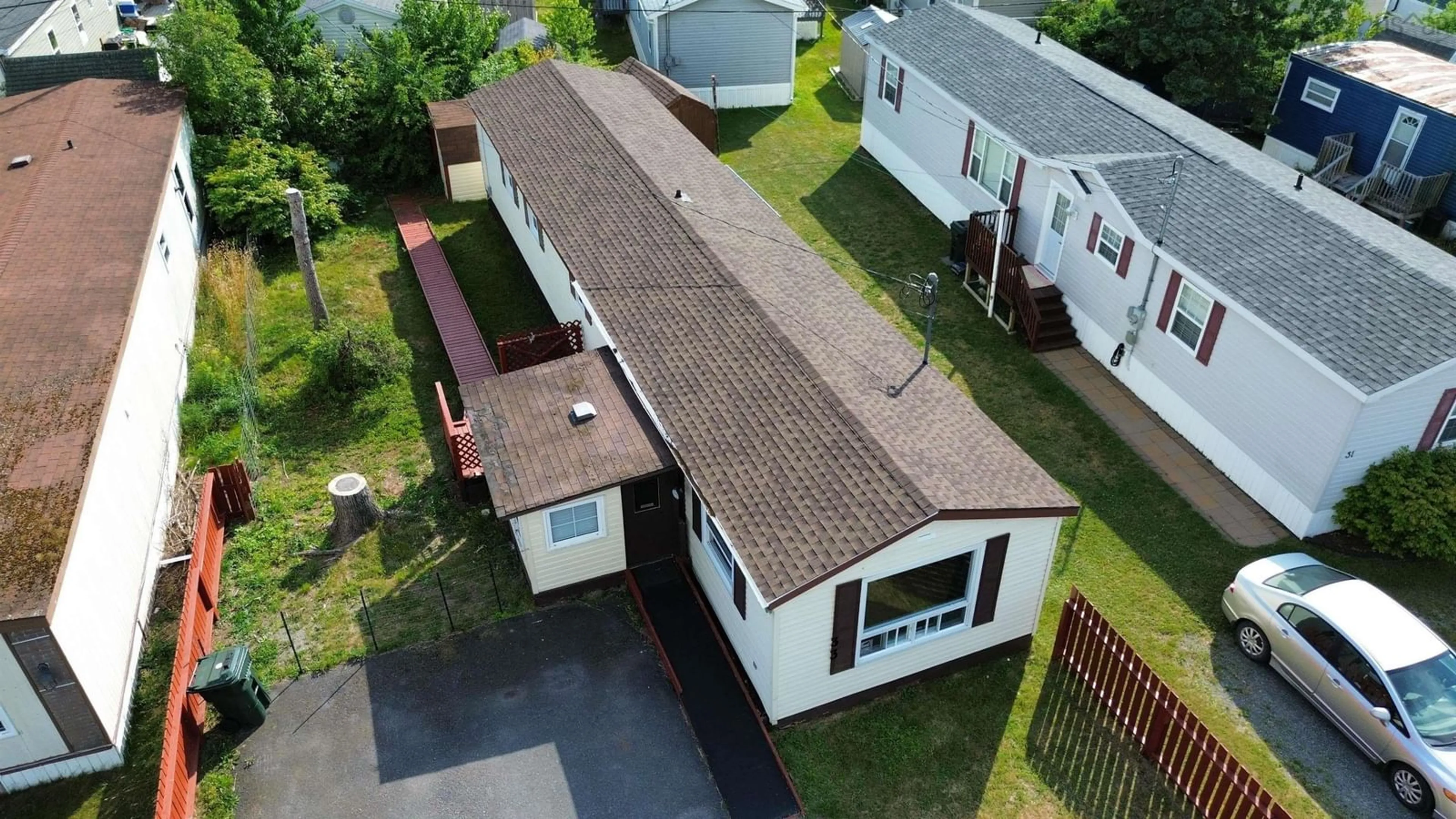 A pic from outside/outdoor area/front of a property/back of a property/a pic from drone, building for 33 First St, Howie Centre Nova Scotia B1L 1C9