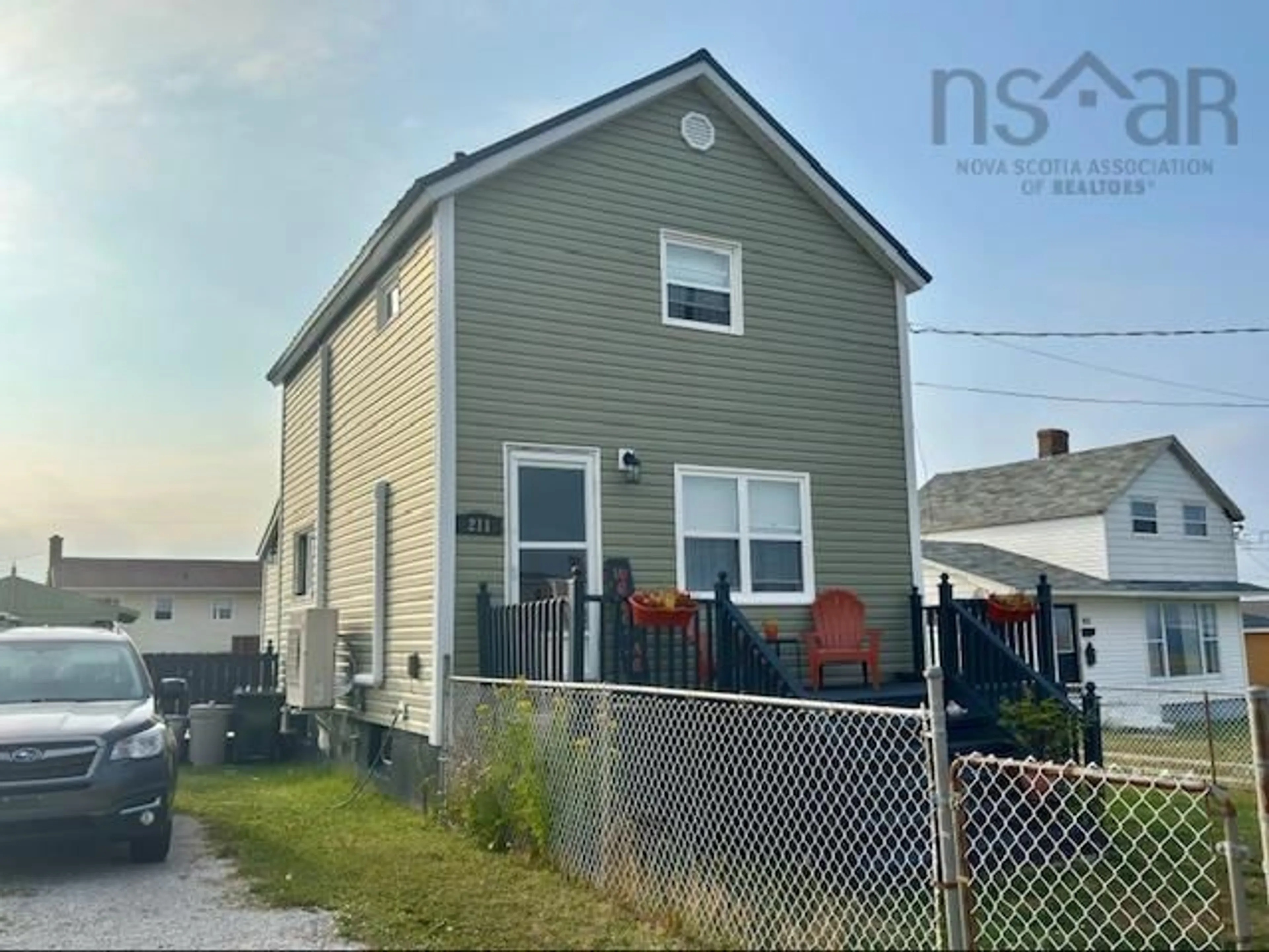Home with vinyl exterior material, street for 211 Ling St, New Waterford Nova Scotia B1H 2W3
