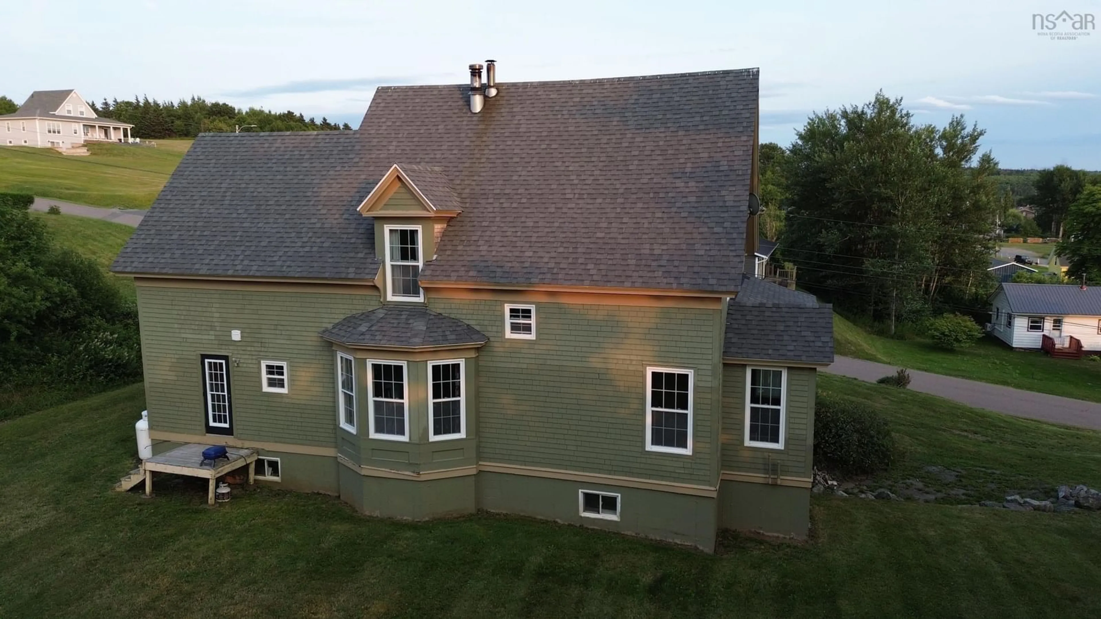 A pic from outside/outdoor area/front of a property/back of a property/a pic from drone, building for 21 Fraser St, Port Hood Nova Scotia B0E 2W0