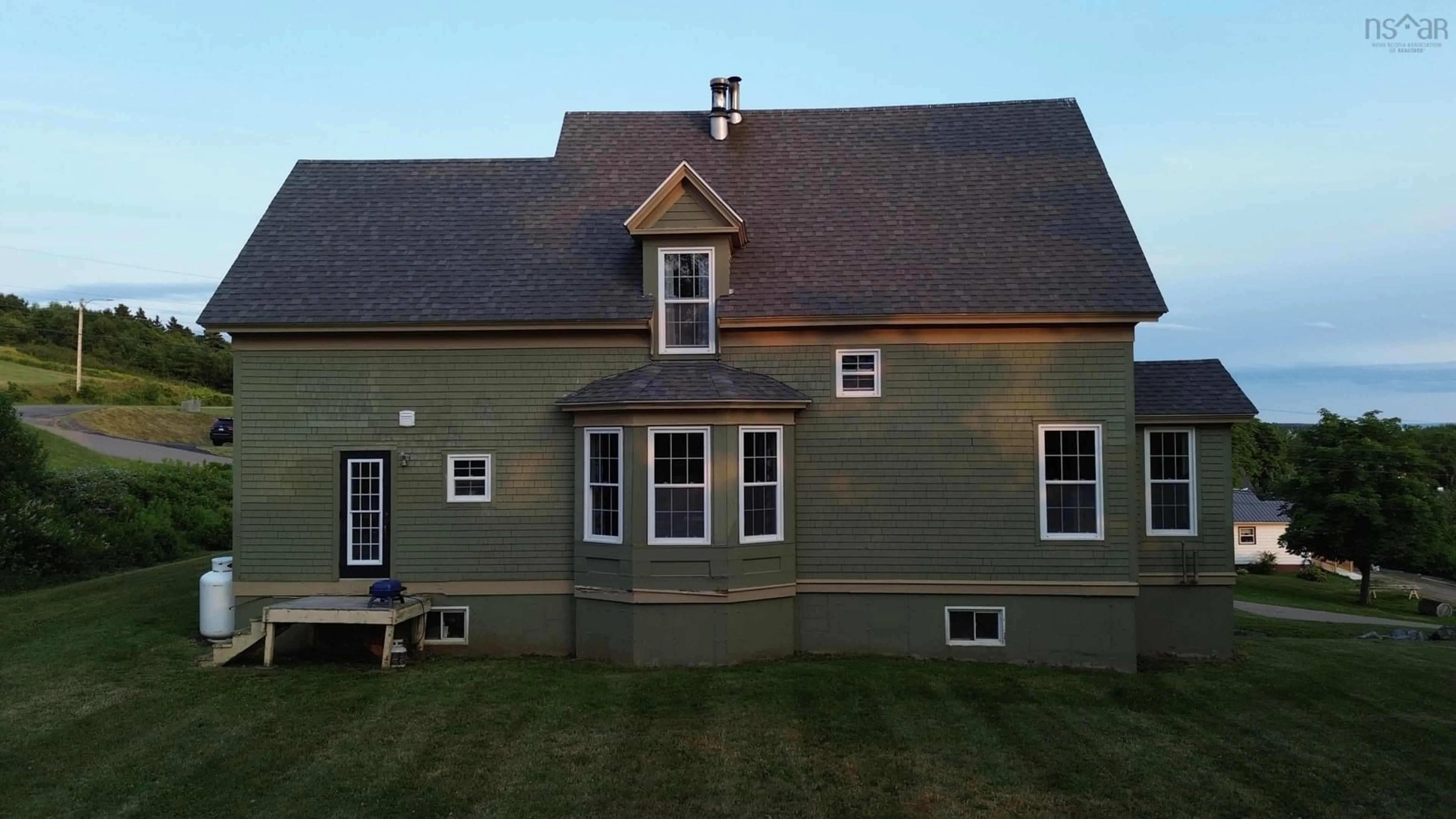 Home with vinyl exterior material, building for 21 Fraser St, Port Hood Nova Scotia B0E 2W0
