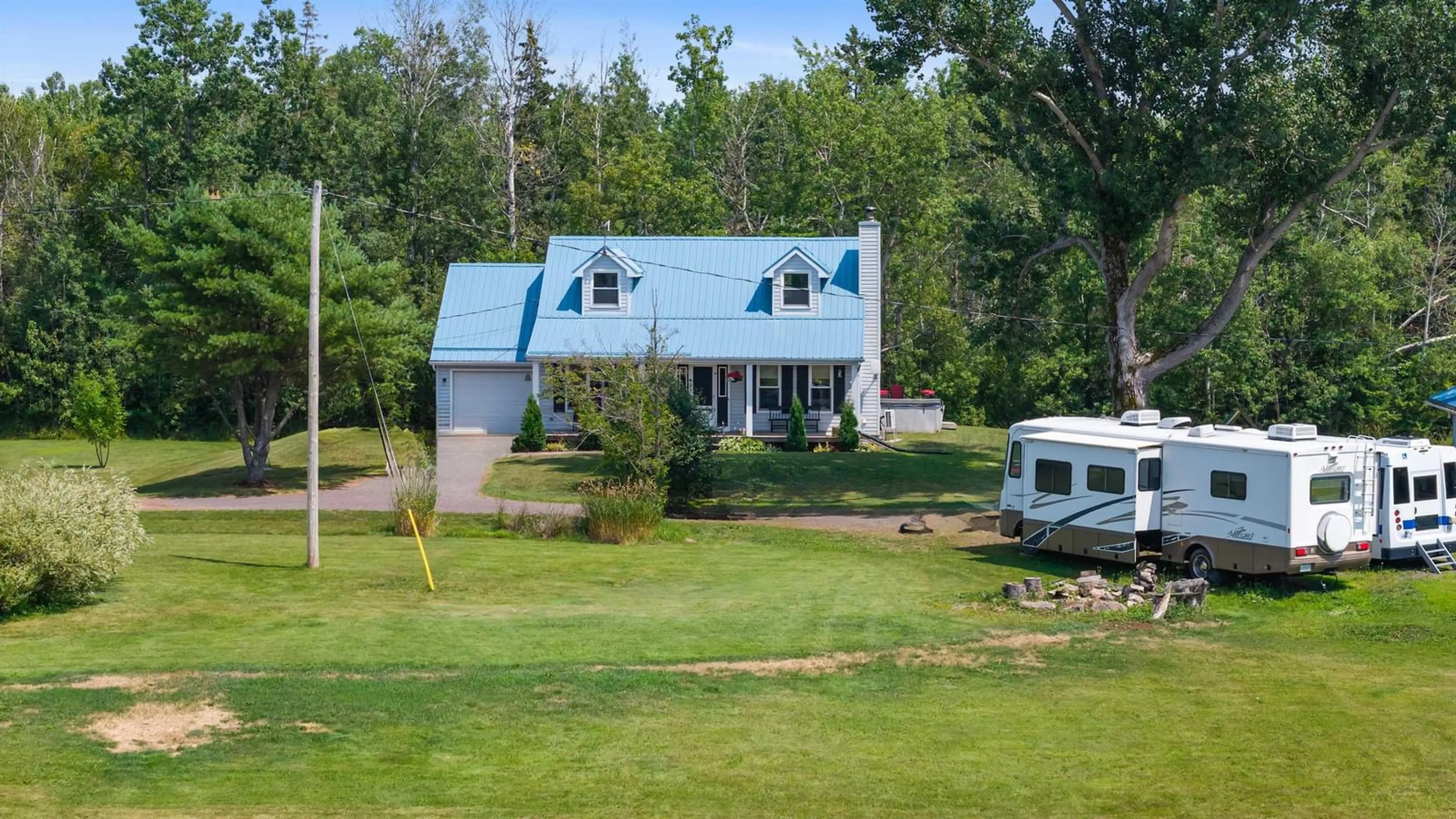 A pic from outside/outdoor area/front of a property/back of a property/a pic from drone, water/lake/river/ocean view for 3264 Highway 6, Waldegrave Nova Scotia B0K 1V0