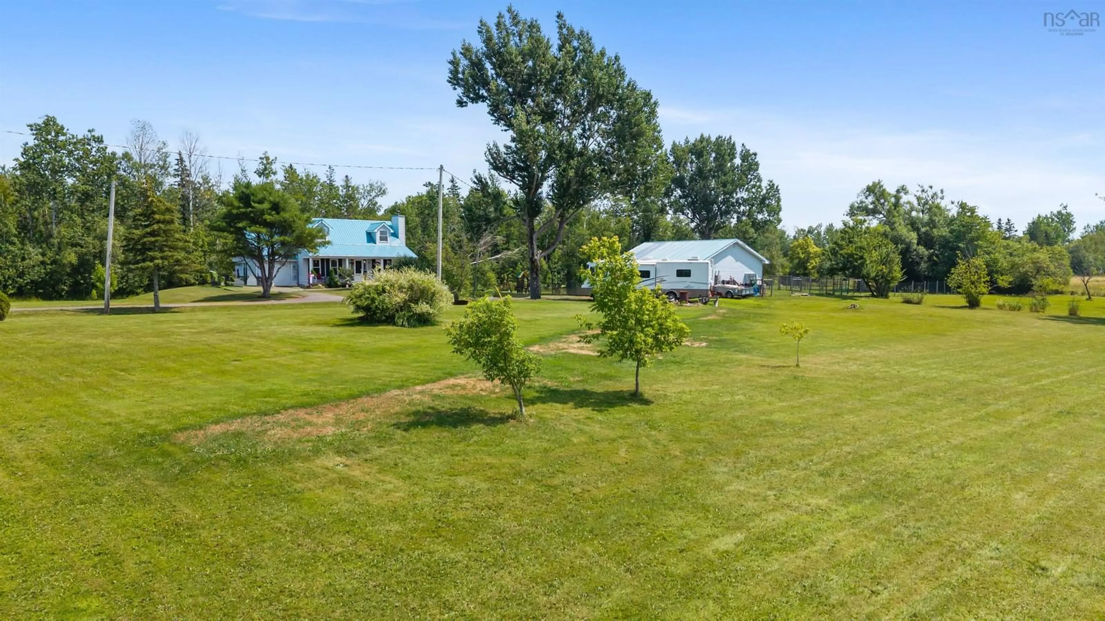 A pic from outside/outdoor area/front of a property/back of a property/a pic from drone, water/lake/river/ocean view for 3264 Highway 6, Waldegrave Nova Scotia B0K 1V0