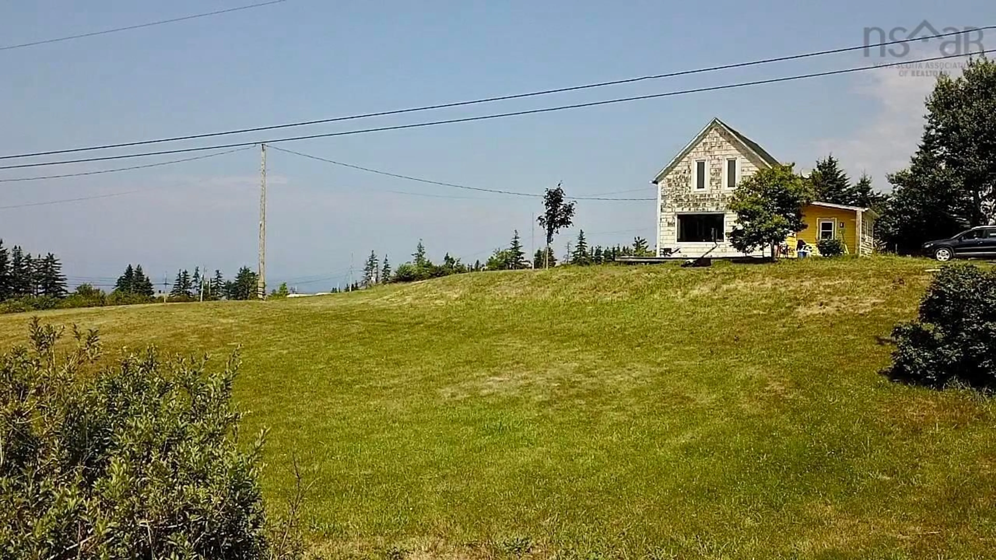 A pic from outside/outdoor area/front of a property/back of a property/a pic from drone, water/lake/river/ocean view for 760 Foot Cape Rd, Inverness Nova Scotia B0E 1N0