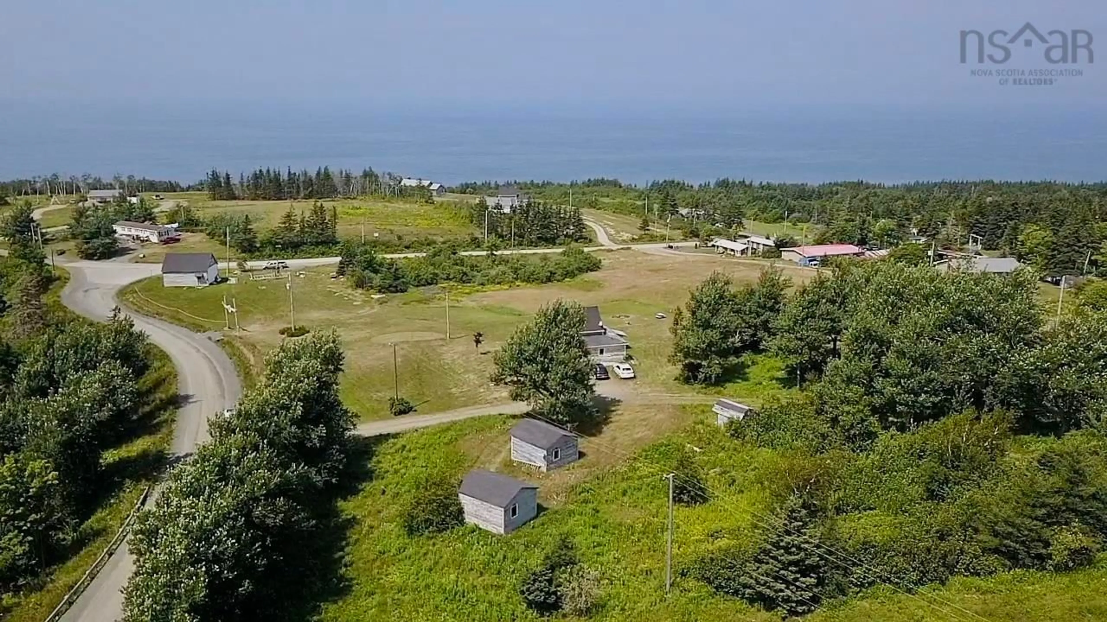 A pic from outside/outdoor area/front of a property/back of a property/a pic from drone, water/lake/river/ocean view for 760 Foot Cape Rd, Inverness Nova Scotia B0E 1N0