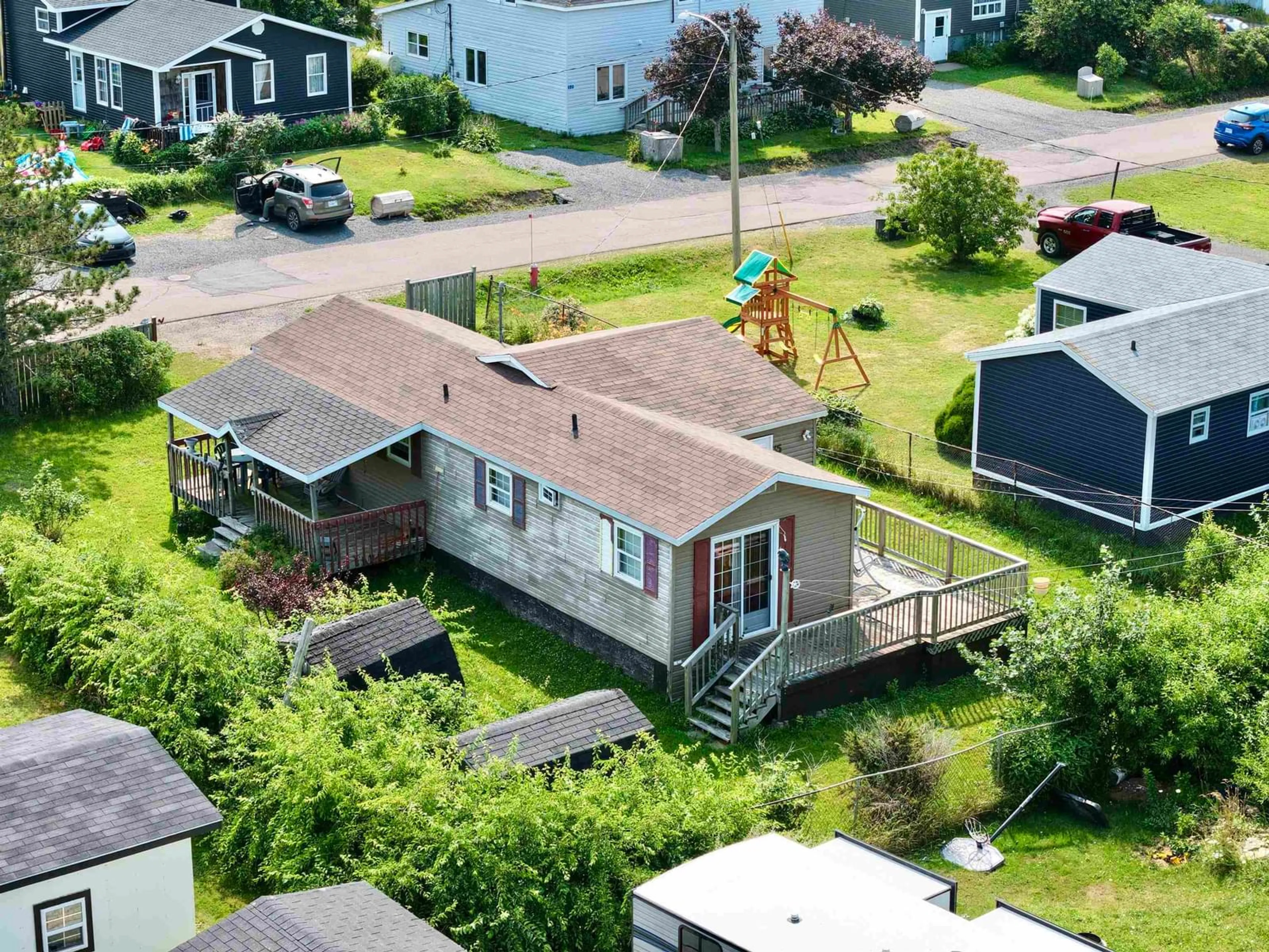 A pic from outside/outdoor area/front of a property/back of a property/a pic from drone, street for 35 Allan J Memorial Ave, Inverness Nova Scotia B0E 1N0