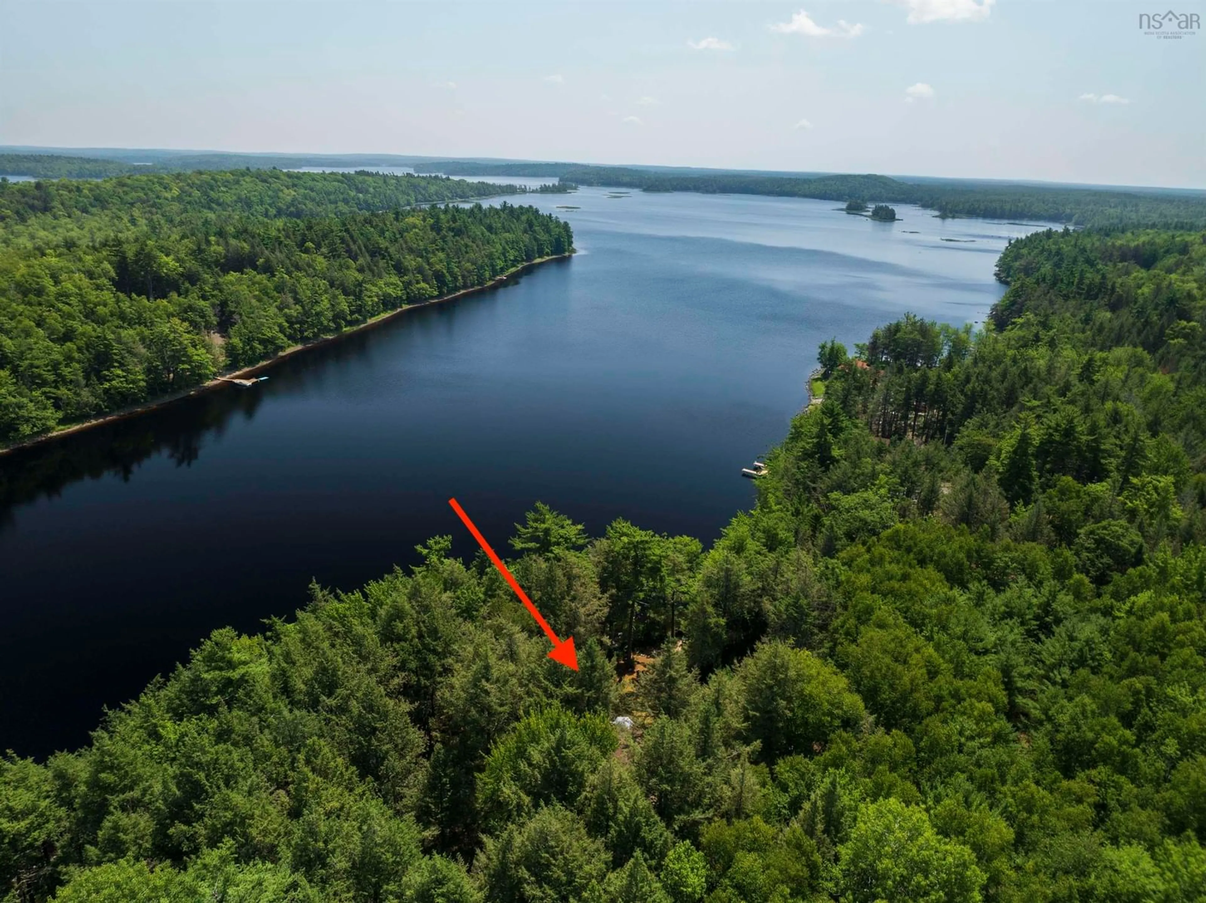 A pic from outside/outdoor area/front of a property/back of a property/a pic from drone, water/lake/river/ocean view for 569 Peters Point Rd, South Brookfield Nova Scotia B0T 1X0