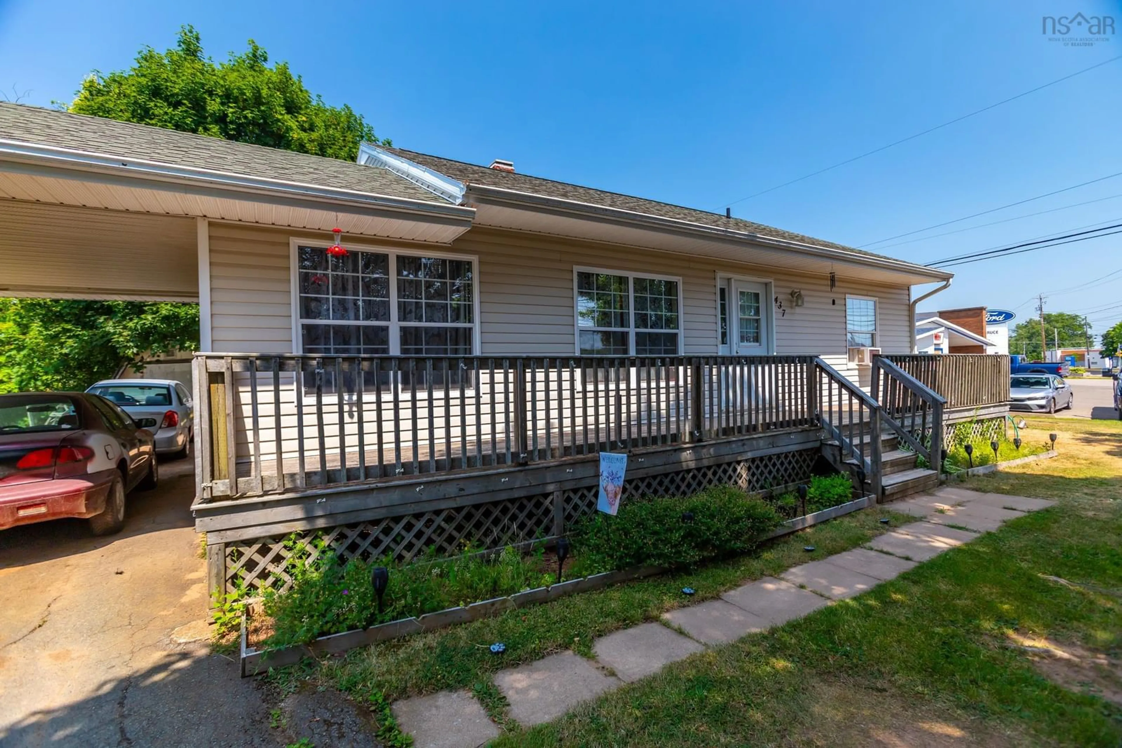 Home with vinyl exterior material, street for 437 Main St, Middleton Nova Scotia B0P 1M0