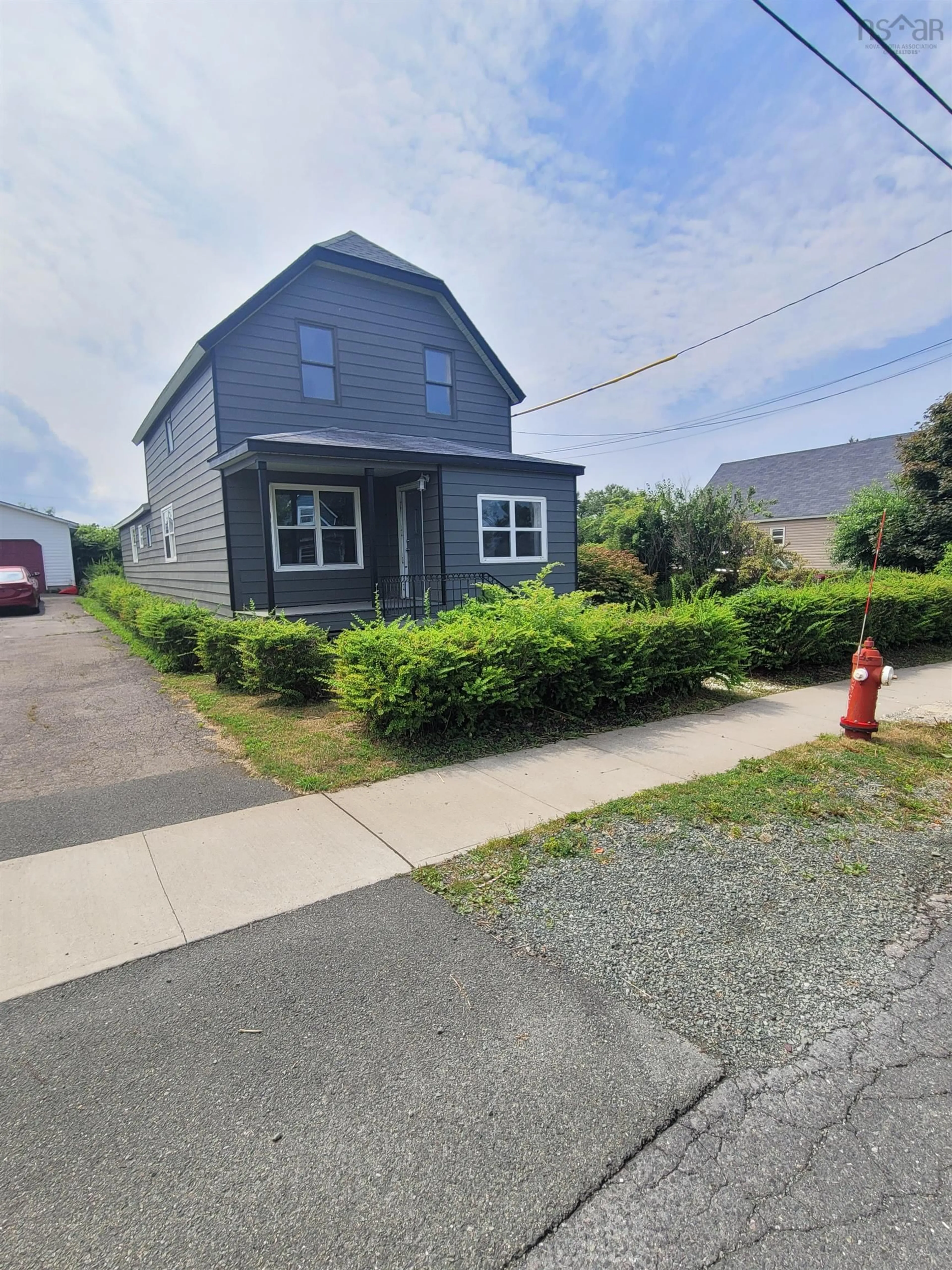 A pic from outside/outdoor area/front of a property/back of a property/a pic from drone, street for 22 Dragatis St, Glace Bay Nova Scotia B1A 2B5