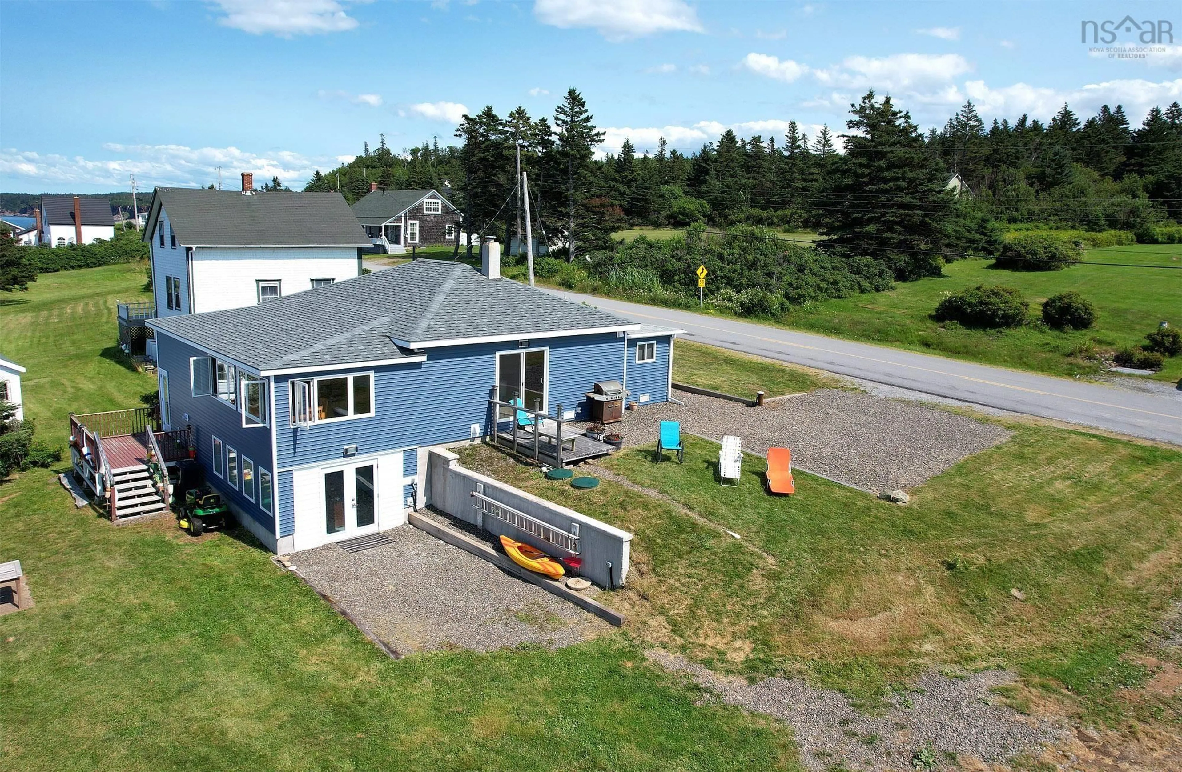 A pic from outside/outdoor area/front of a property/back of a property/a pic from drone, unknown for 12443 Shore Rd, Port George Nova Scotia B0S 1P0