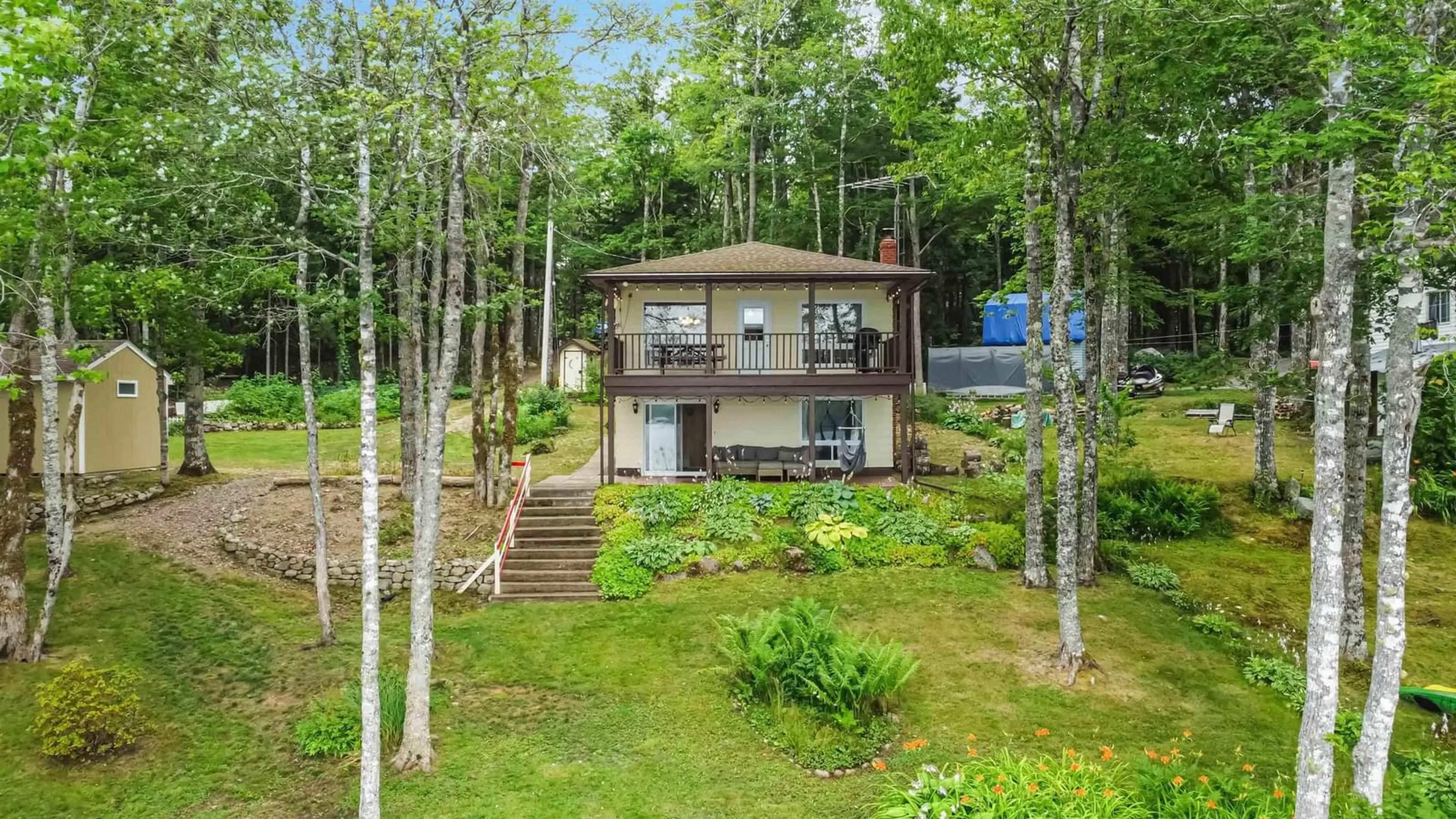 A pic from outside/outdoor area/front of a property/back of a property/a pic from drone, forest/trees view for 1114 Trout Lake Rd, New Albany Nova Scotia B0S 1P0