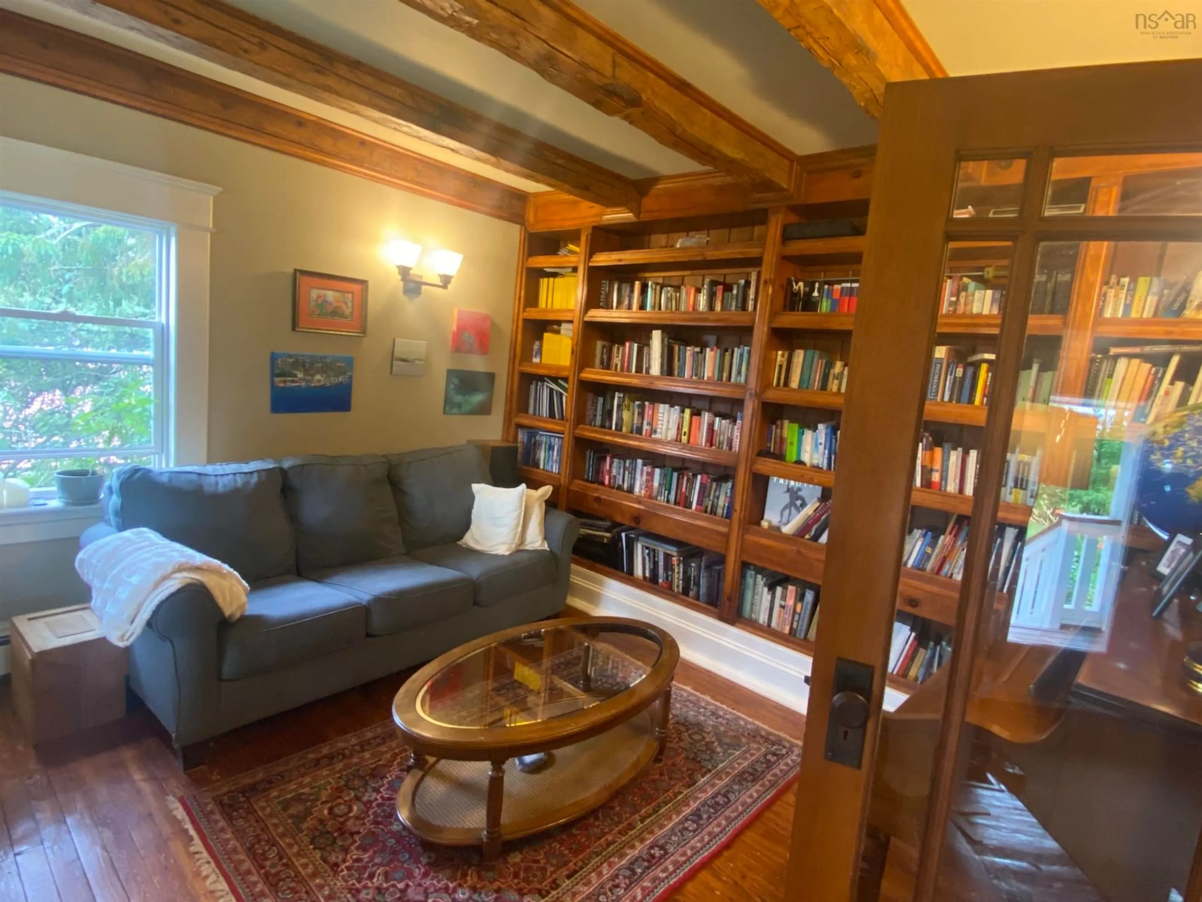 Living room with furniture, wood/laminate floor for 13 Onslow Rd, Central Onslow Nova Scotia B6L 5K3