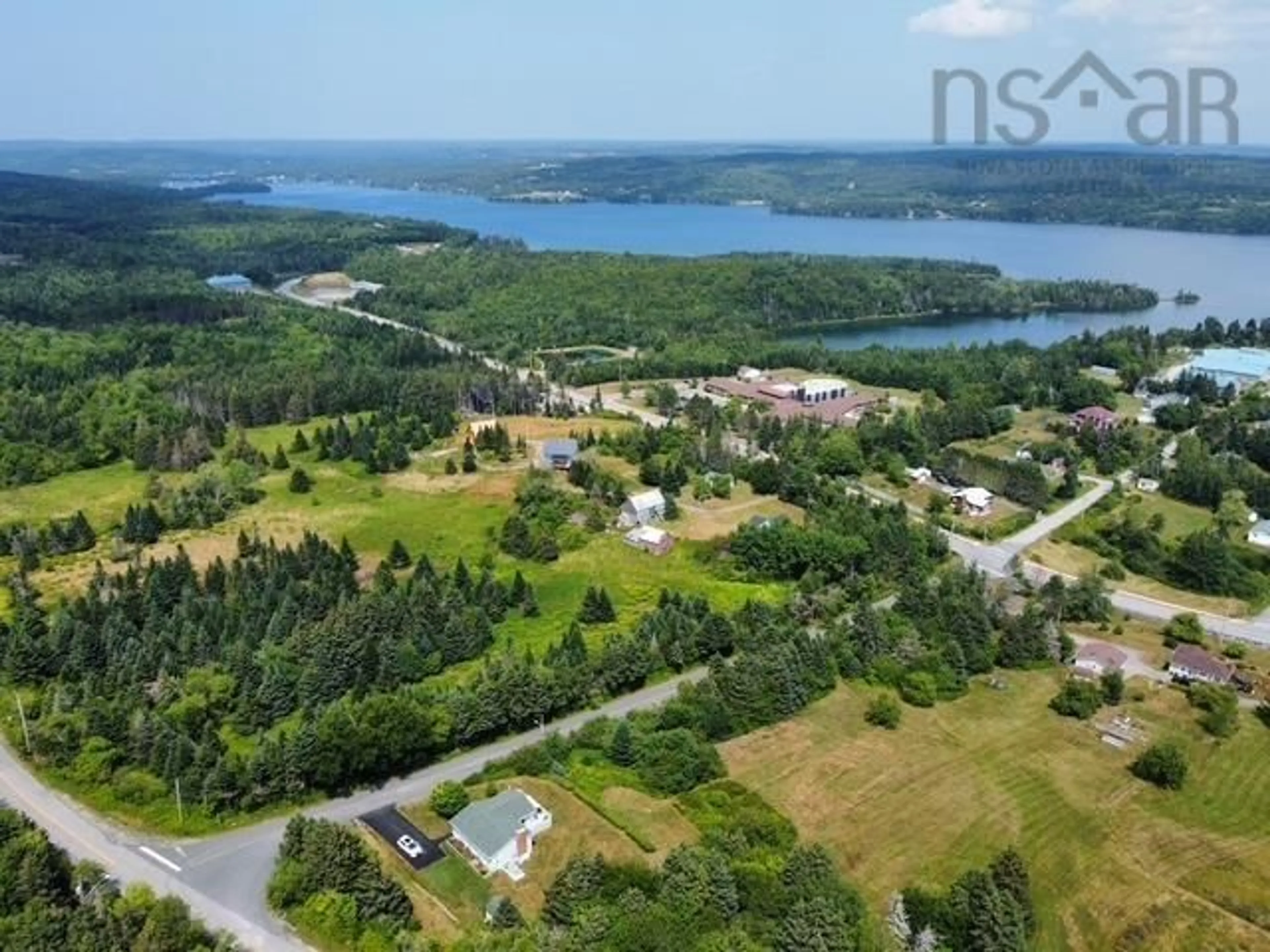 A pic from outside/outdoor area/front of a property/back of a property/a pic from drone, water/lake/river/ocean view for 39 Falkland Lane, Guysborough Nova Scotia B0H 1N0