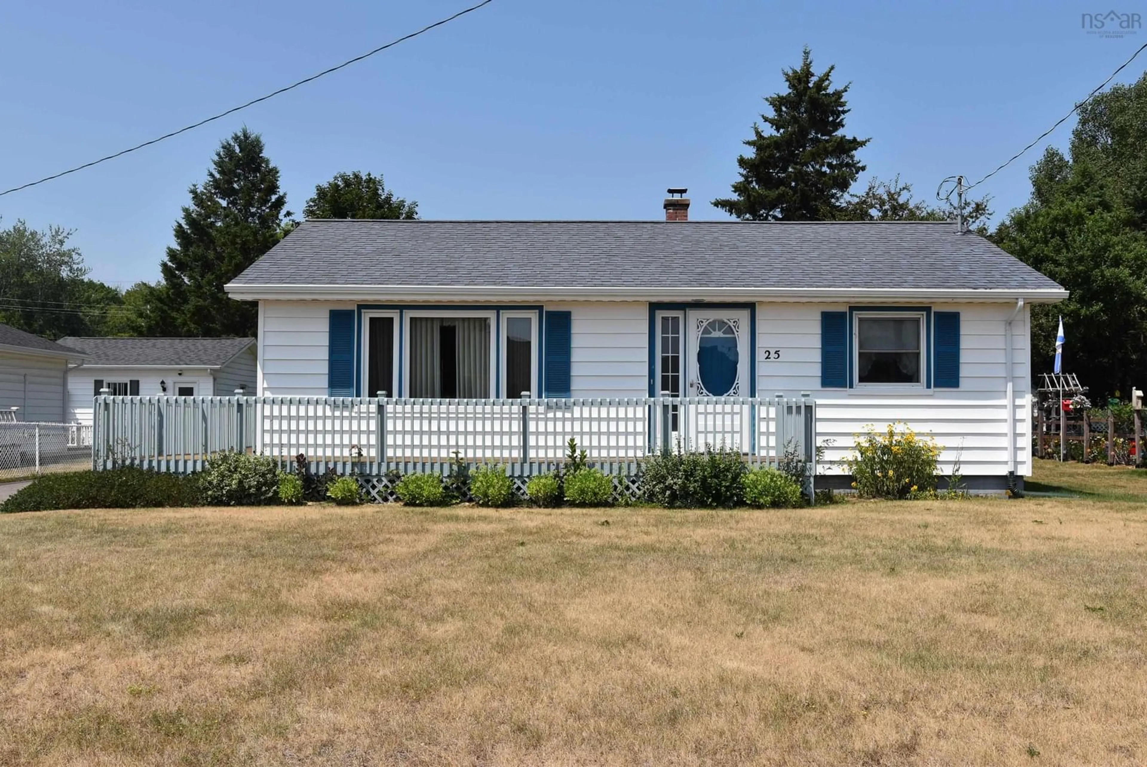 Home with vinyl exterior material, street for 25 Acadia St, Middleton Nova Scotia B0S 1P0