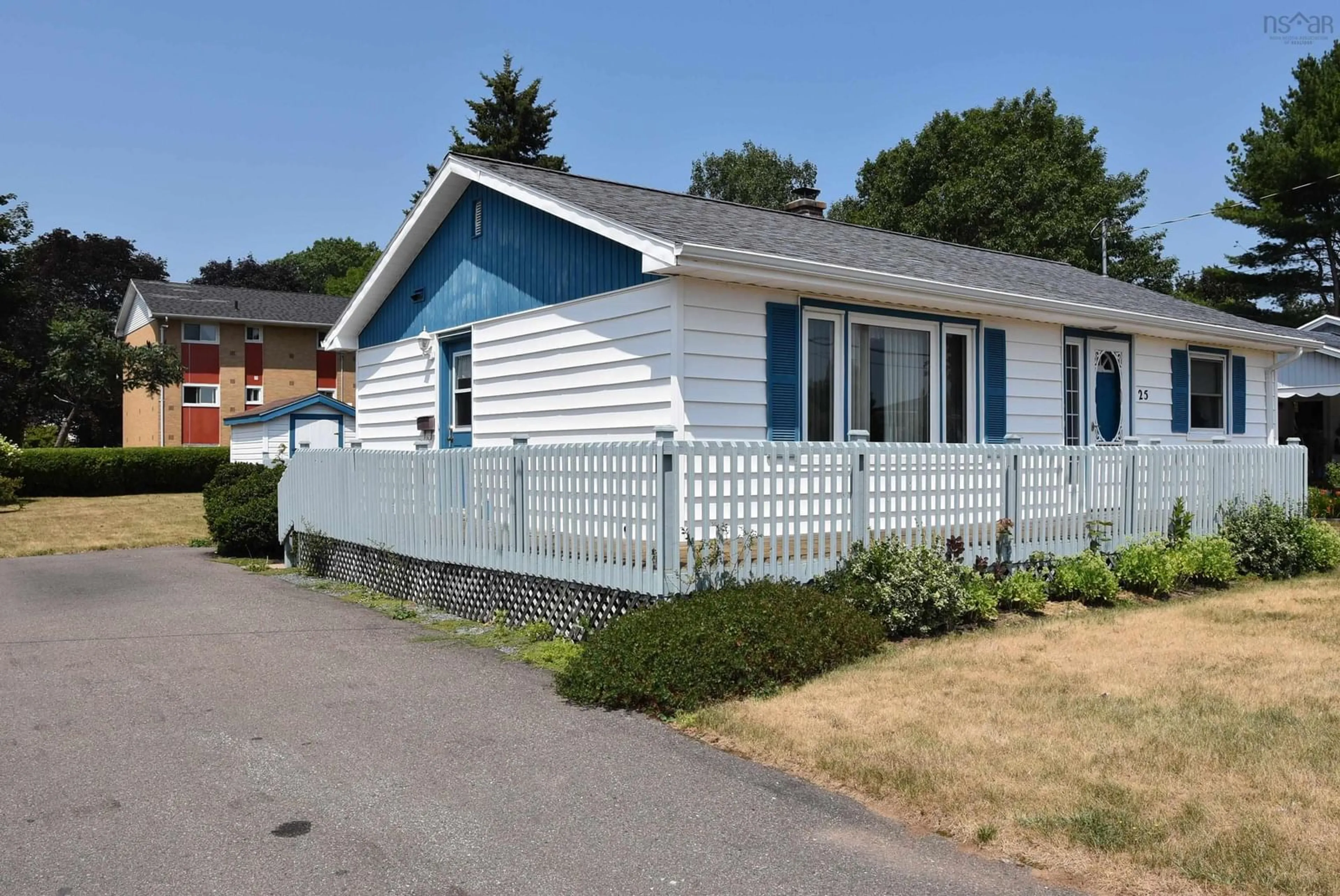Home with vinyl exterior material, street for 25 Acadia St, Middleton Nova Scotia B0S 1P0