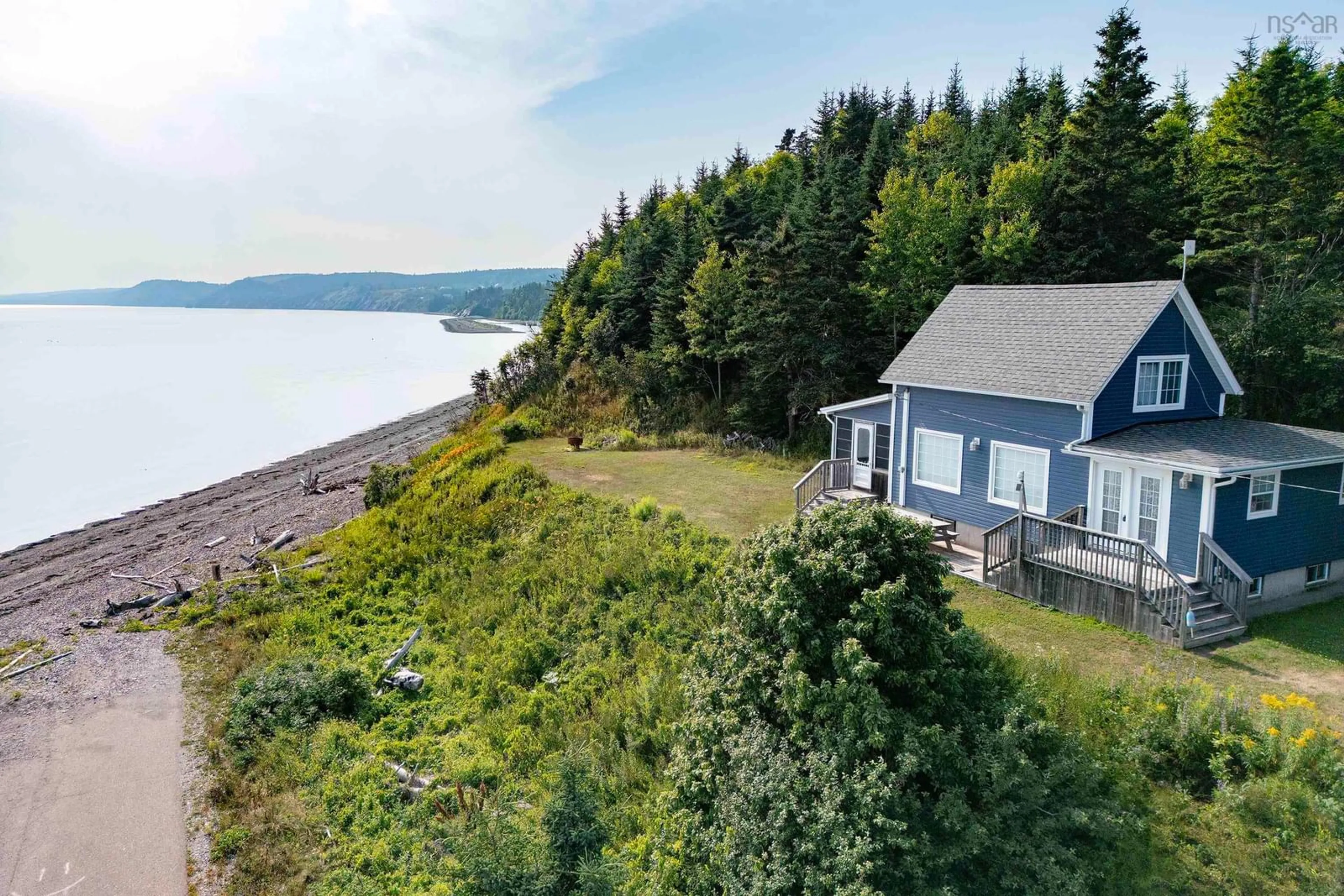 A pic from outside/outdoor area/front of a property/back of a property/a pic from drone, water/lake/river/ocean view for 55 Cochrane Rd, Fox River Nova Scotia B0M 1S0