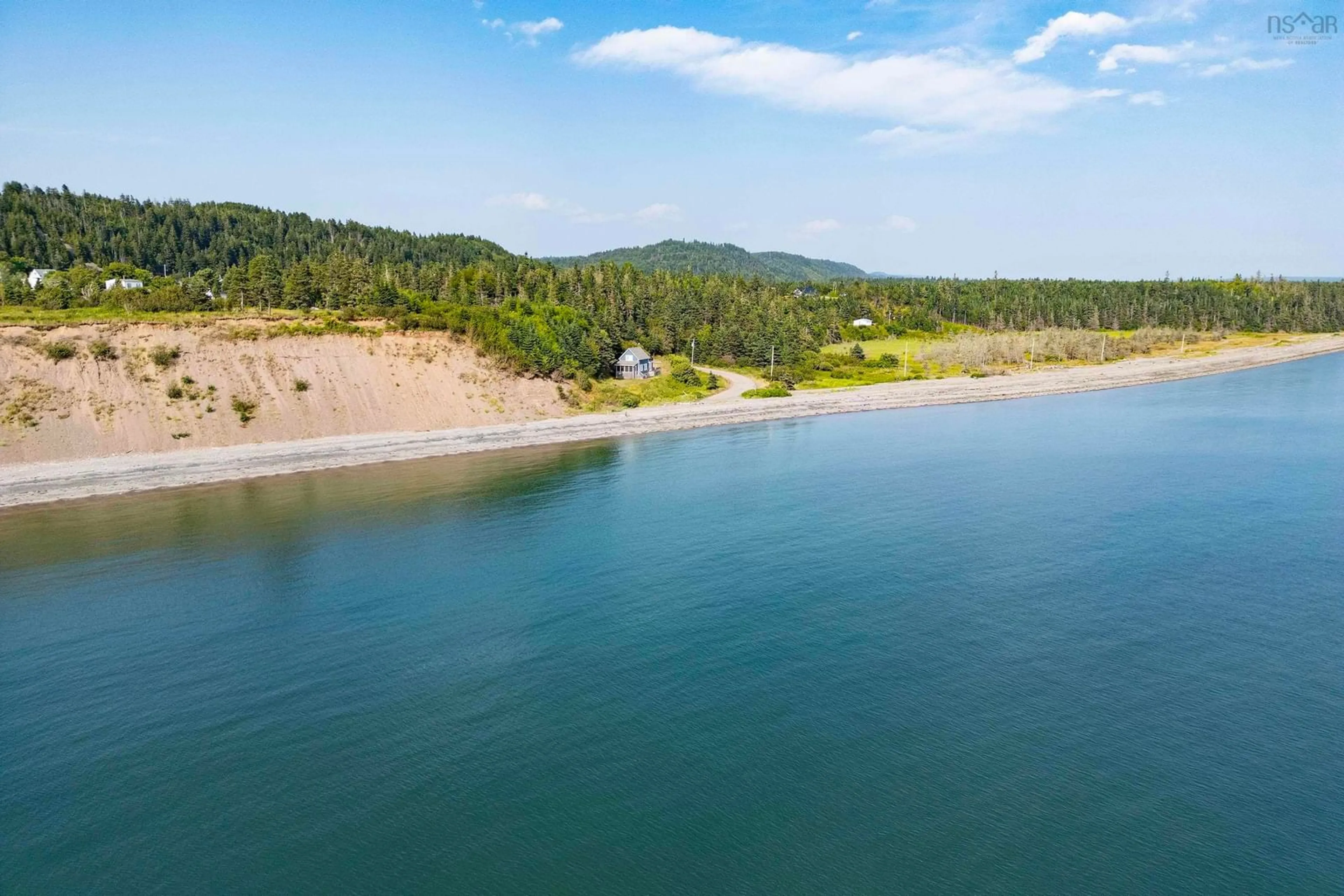A pic from outside/outdoor area/front of a property/back of a property/a pic from drone, water/lake/river/ocean view for 55 Cochrane Rd, Fox River Nova Scotia B0M 1S0