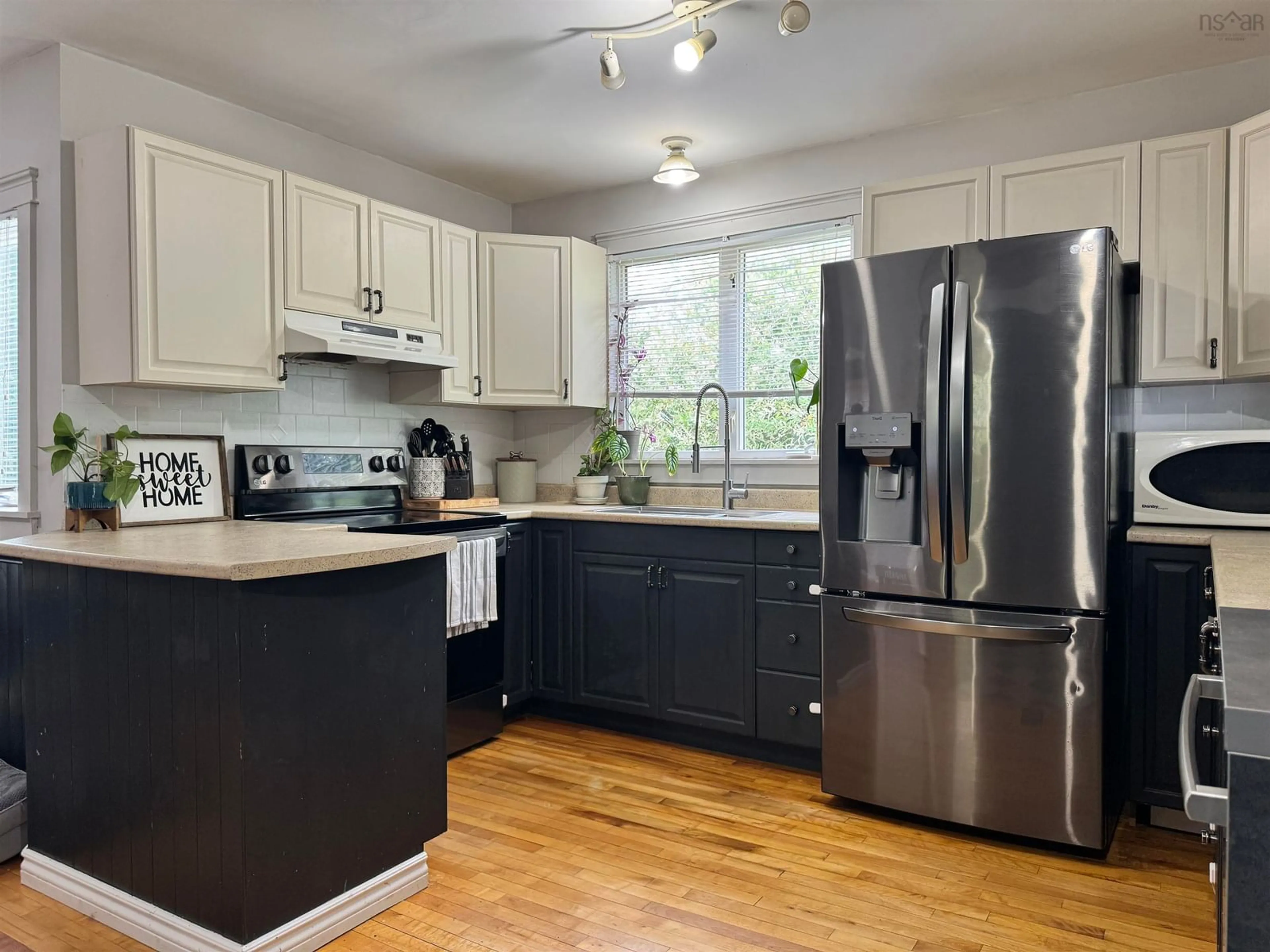 Open concept kitchen, wood/laminate floor for 790 Trenton Rd, New Glasgow Nova Scotia B2H 2M8