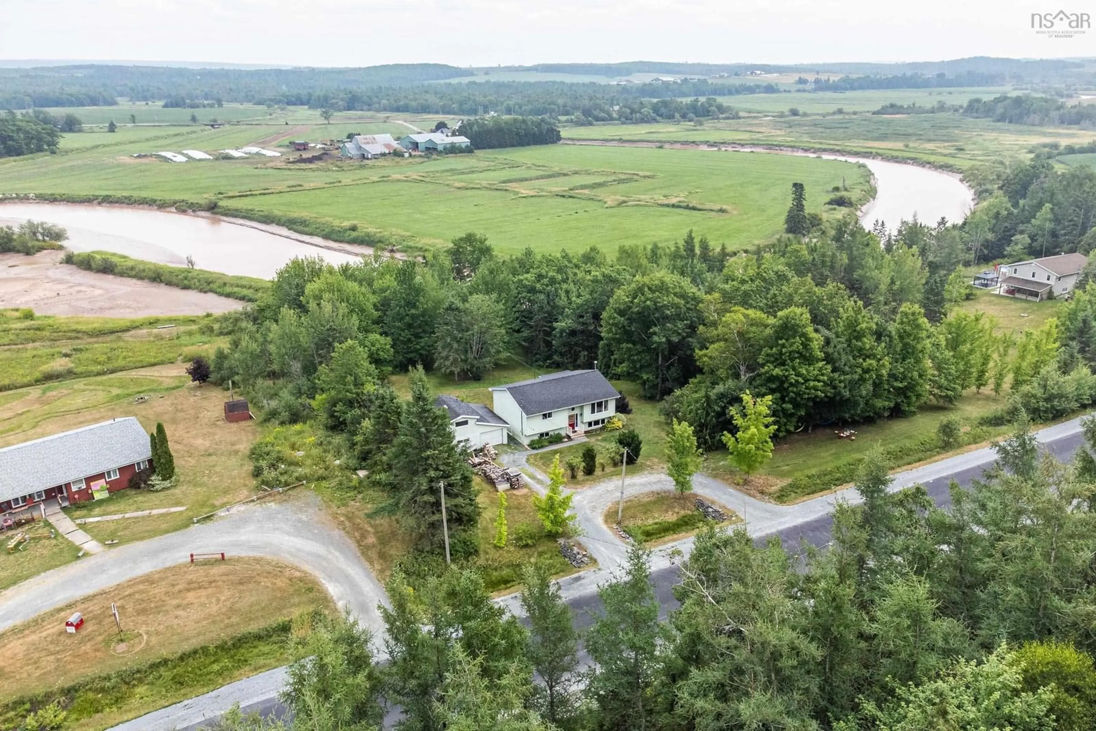 A pic from outside/outdoor area/front of a property/back of a property/a pic from drone, water/lake/river/ocean view for 110 Highway 224, Shubenacadie Nova Scotia B0N 2H0