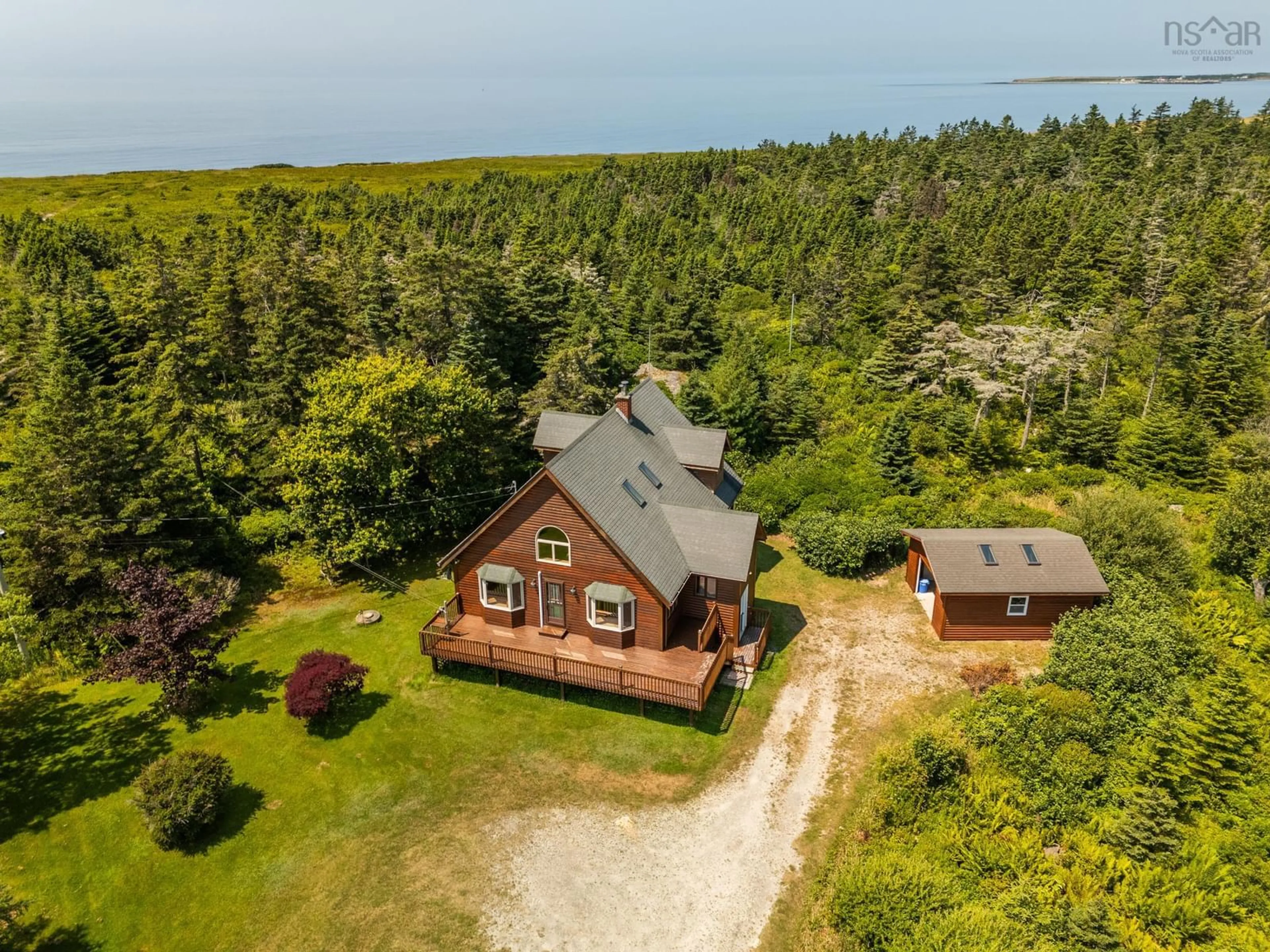 A pic from outside/outdoor area/front of a property/back of a property/a pic from drone, water/lake/river/ocean view for 708 Highway 304, Overton Nova Scotia B5A 5G6
