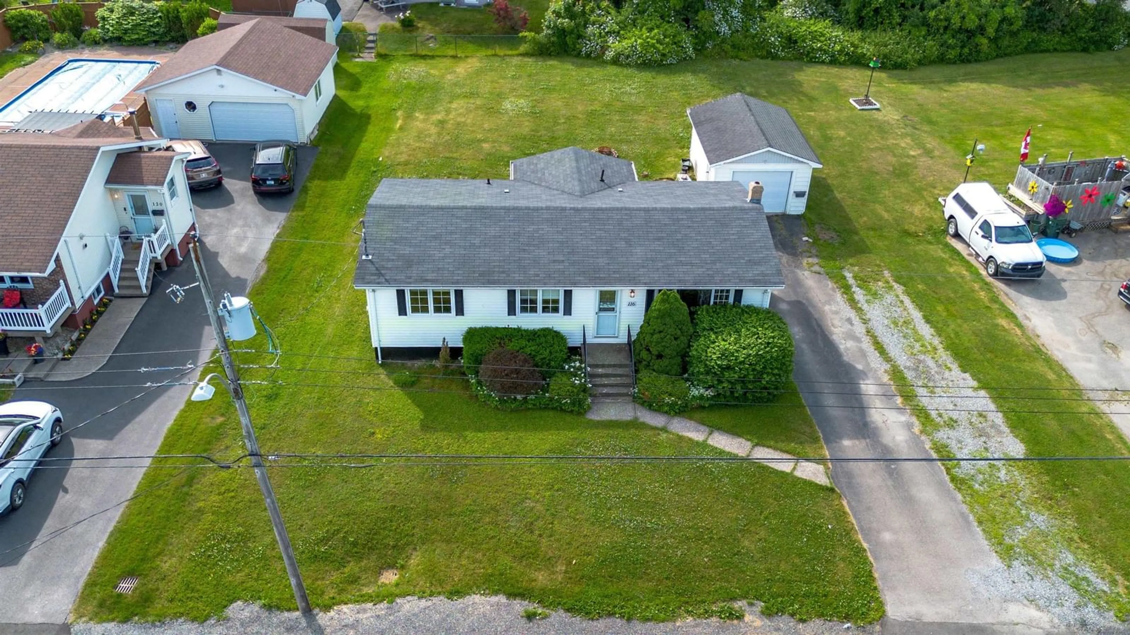 A pic from outside/outdoor area/front of a property/back of a property/a pic from drone, street for 116 Brookland St, Glace Bay Nova Scotia B1A 1B4