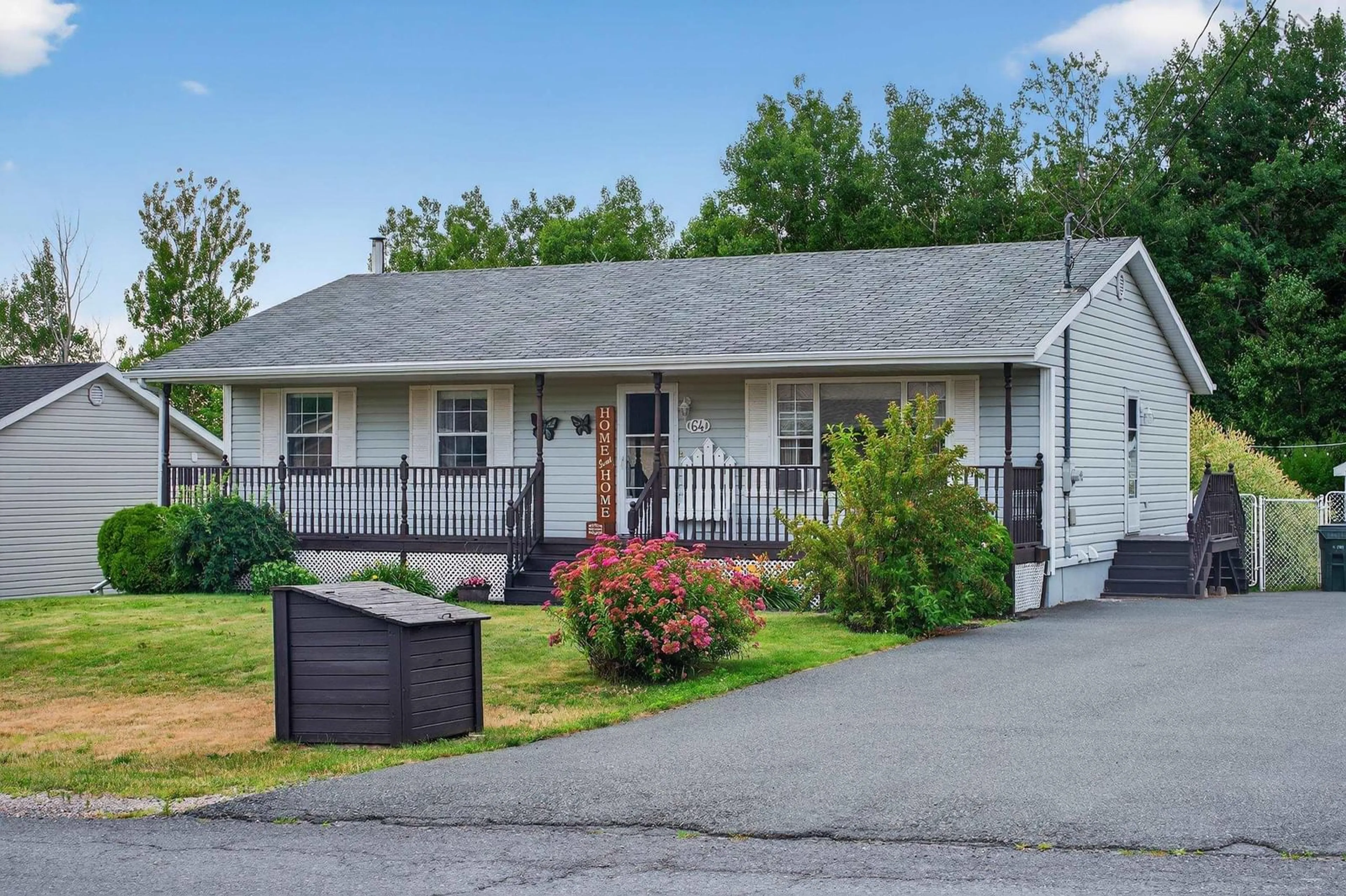 Home with vinyl exterior material, street for 64 Mae Ave, Sydney Mines Nova Scotia B1V 3J1