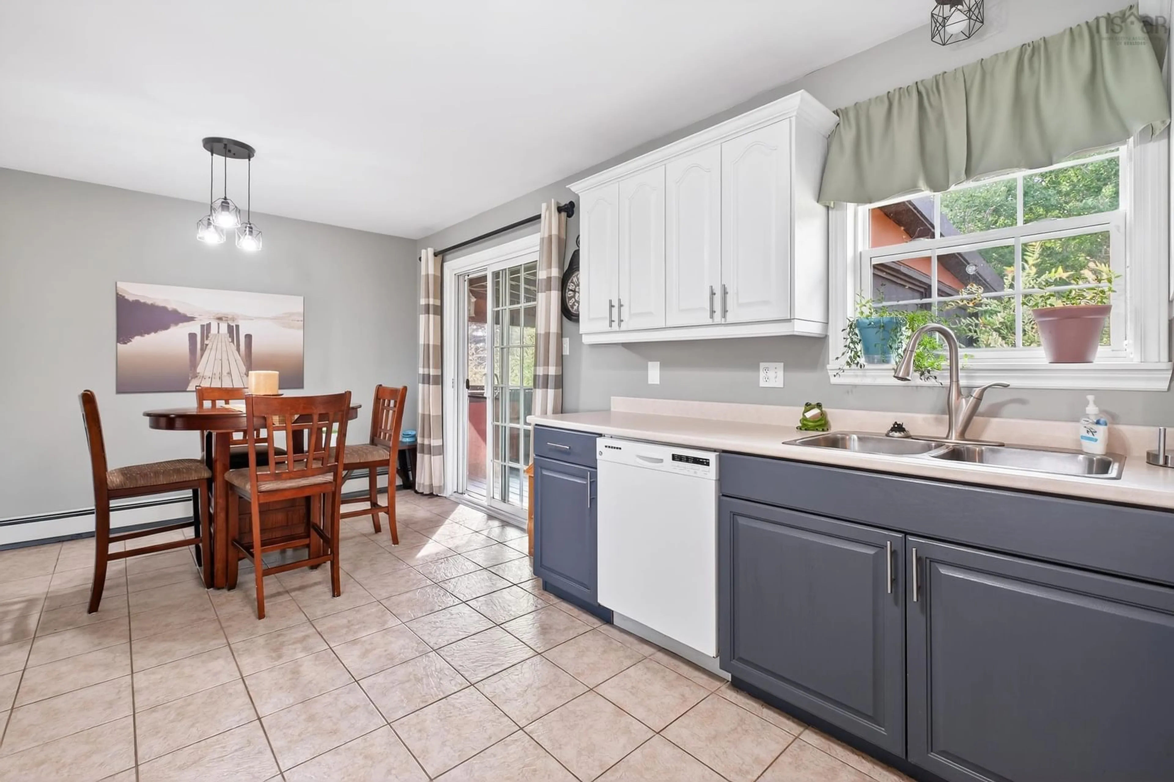 Open concept kitchen, ceramic/tile floor for 64 Mae Ave, Sydney Mines Nova Scotia B1V 3J1