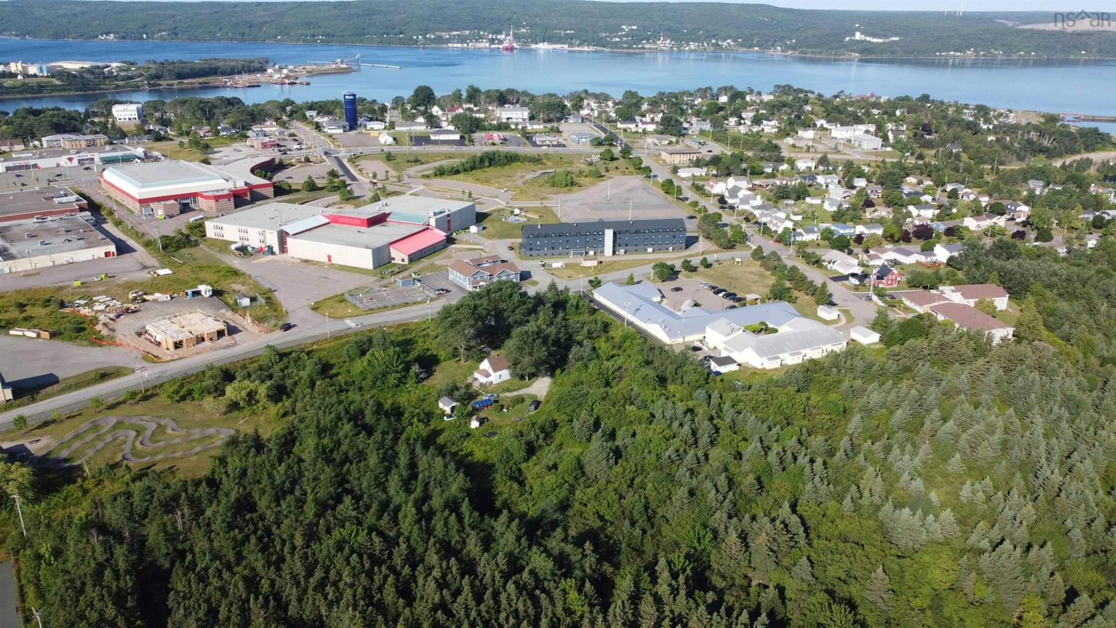 A pic from outside/outdoor area/front of a property/back of a property/a pic from drone, water/lake/river/ocean view for 6 Macquarrie Drive Exten, Port Hawkesbury Nova Scotia B9A 3S9