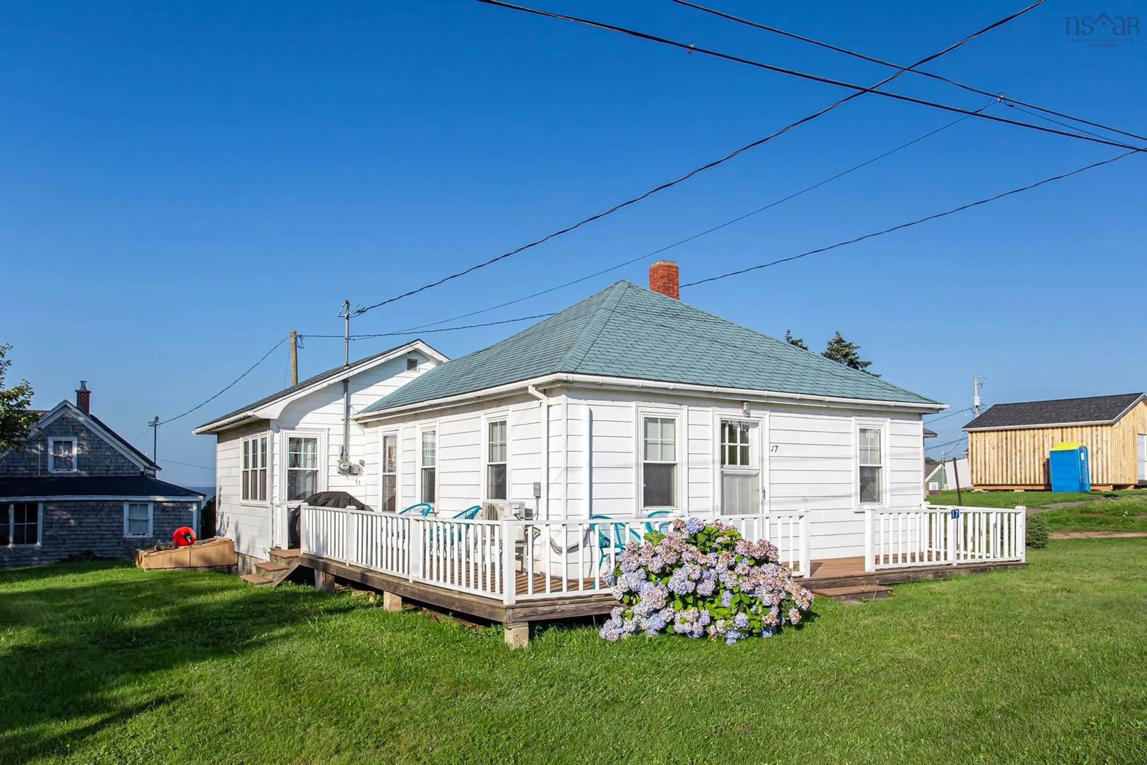 Home with vinyl exterior material, street for 17 Gordon Rd, Margaretsville Nova Scotia B0S 1N0