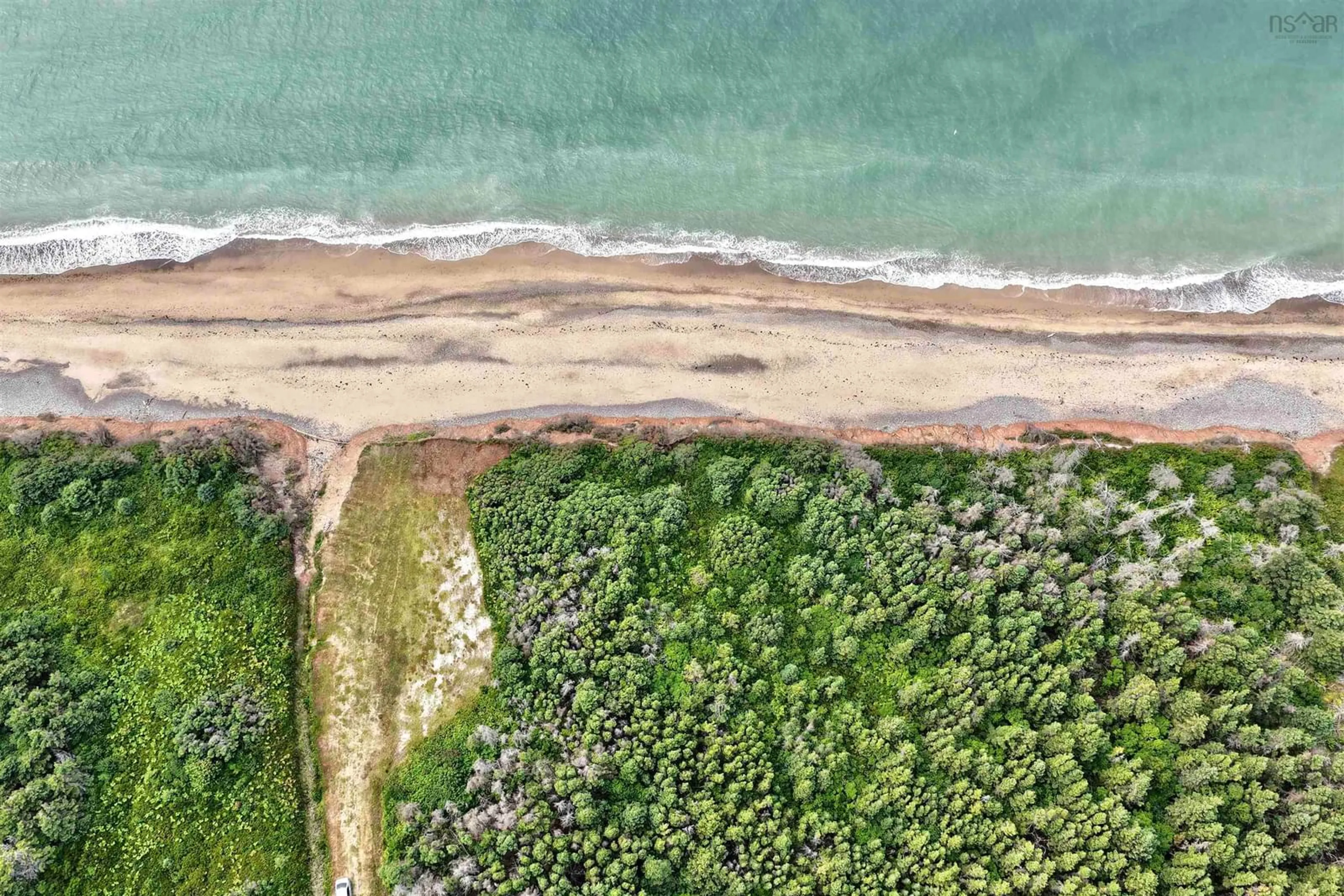 A pic from outside/outdoor area/front of a property/back of a property/a pic from drone, water/lake/river/ocean view for 743 Shore Rd, Dunvegan Nova Scotia B0E 1N0