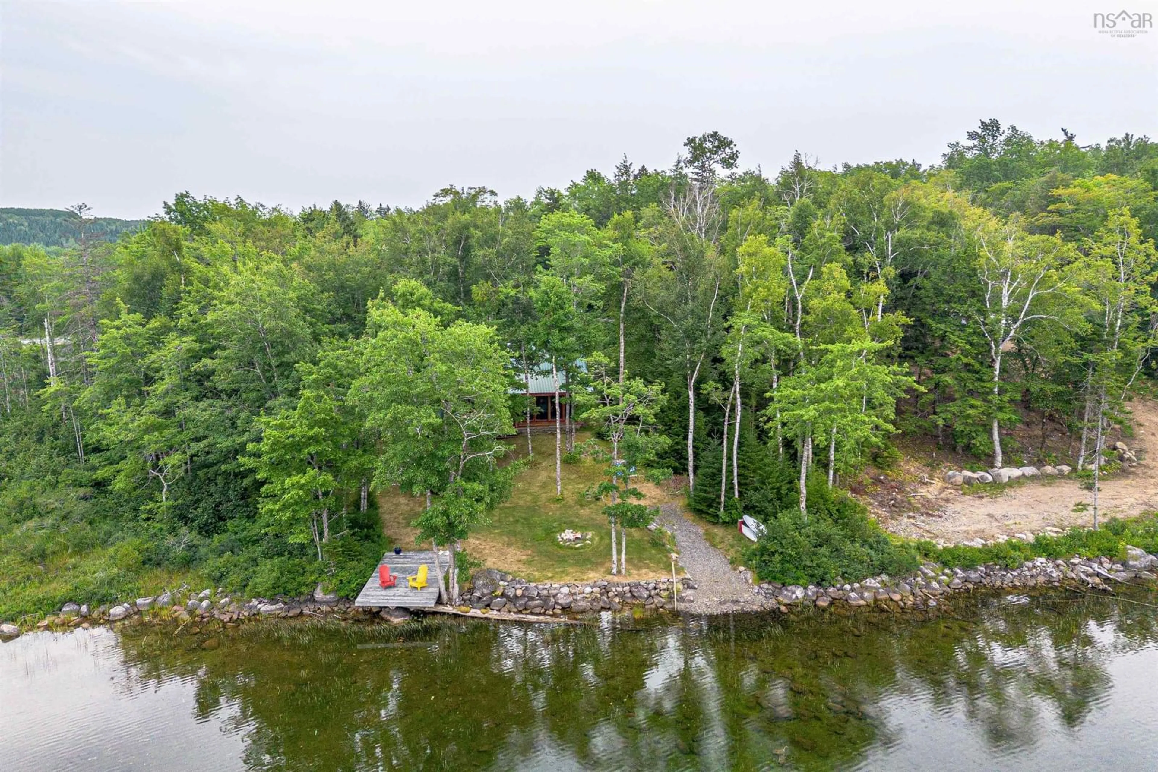 A pic from outside/outdoor area/front of a property/back of a property/a pic from drone, water/lake/river/ocean view for 287 Aylesford Rd, Springfield Nova Scotia B0R 1H0