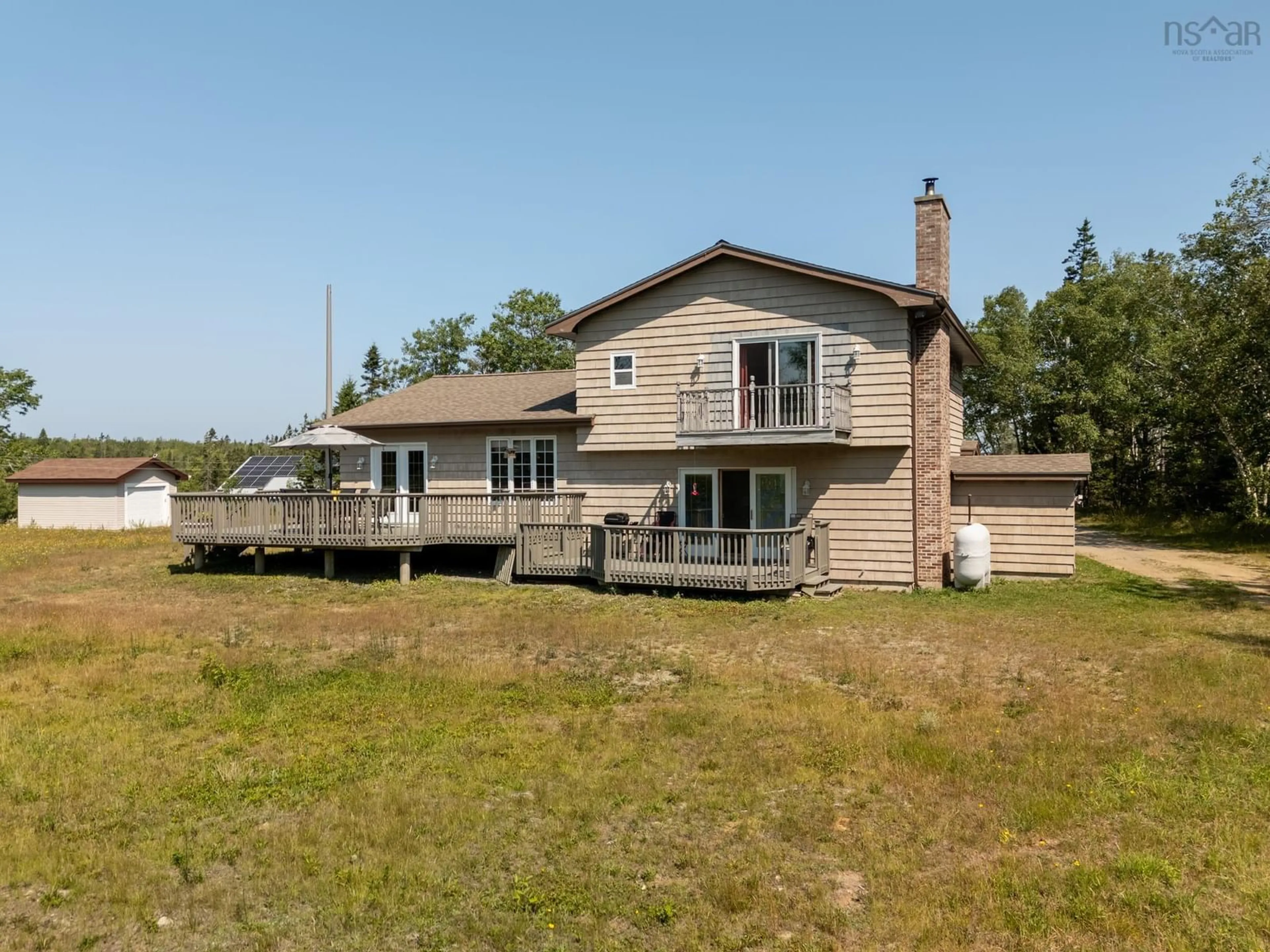 A pic from outside/outdoor area/front of a property/back of a property/a pic from drone, water/lake/river/ocean view for 51 Wood Lane, Upper Wedgeport Nova Scotia B0W 1B0