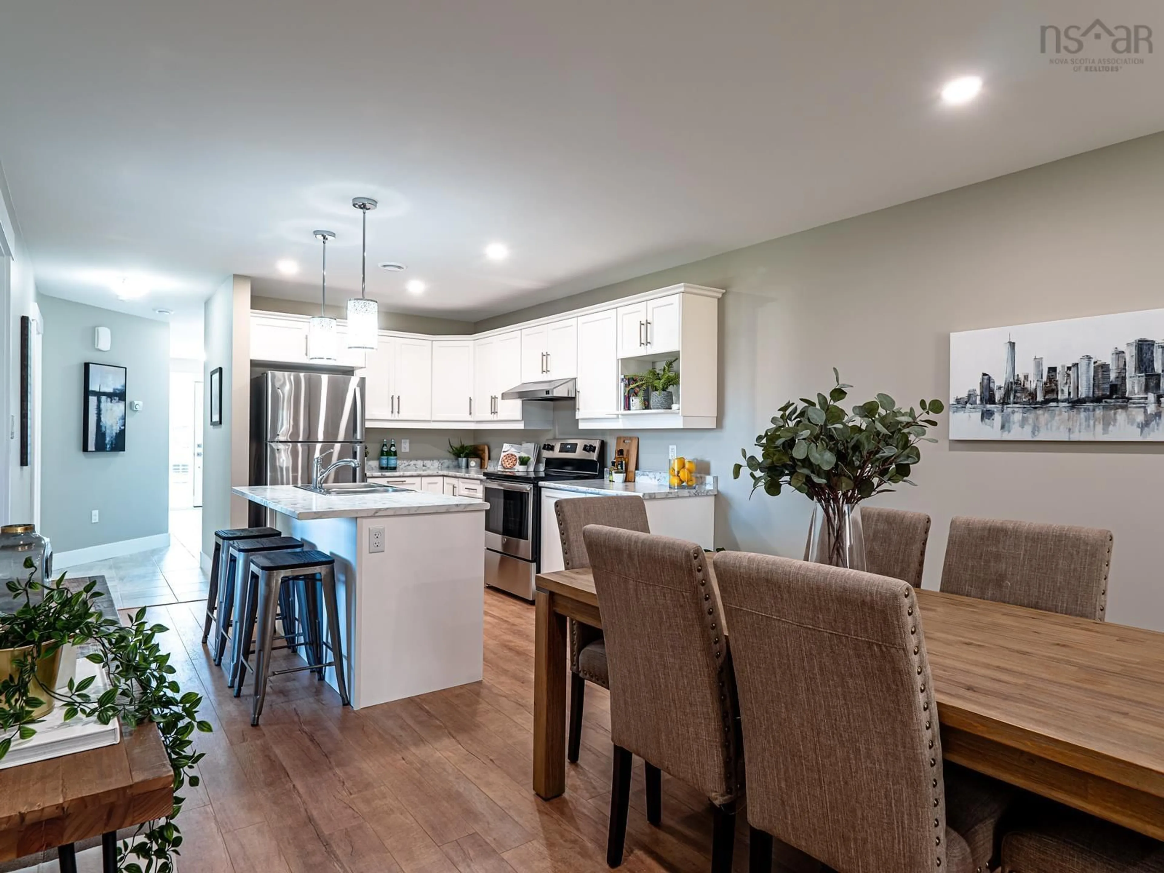 Open concept kitchen, wood/laminate floor for 2 Mama Lien Dr, Lantz Nova Scotia B2S 1T5