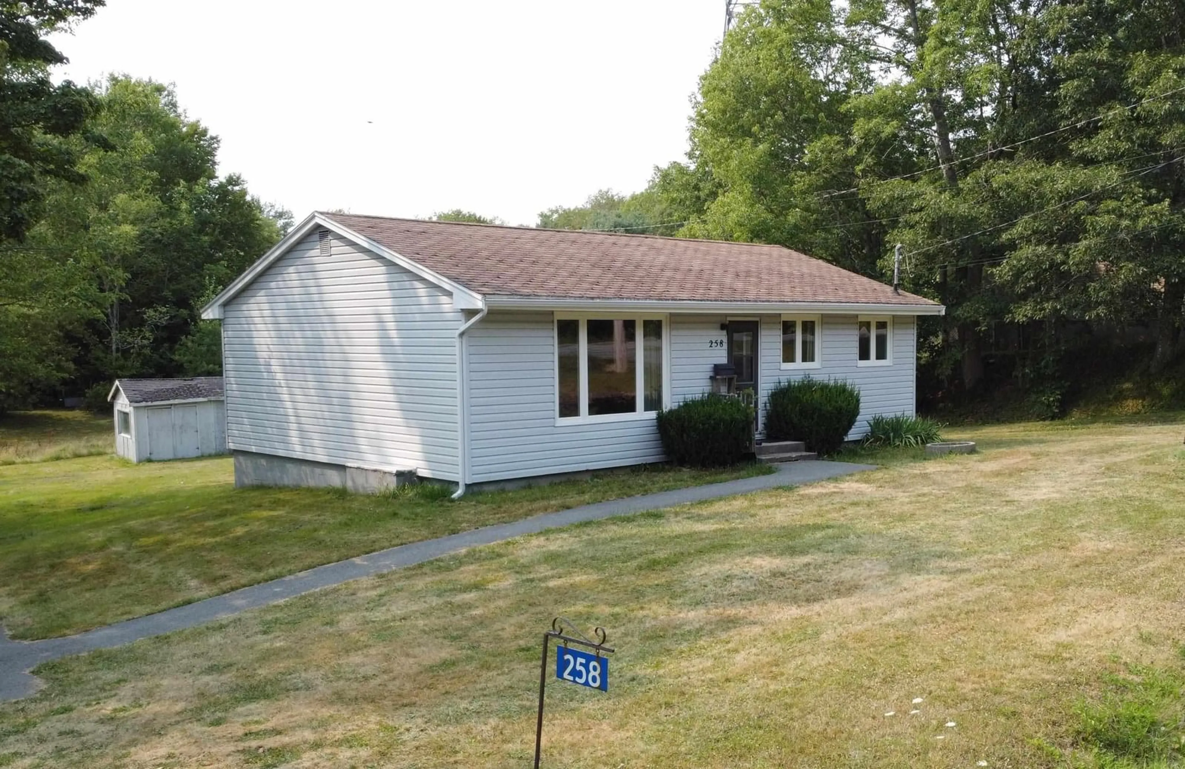 Home with vinyl exterior material, street for 258 Holland Rd, Fletchers Lake Nova Scotia B2T 1A1