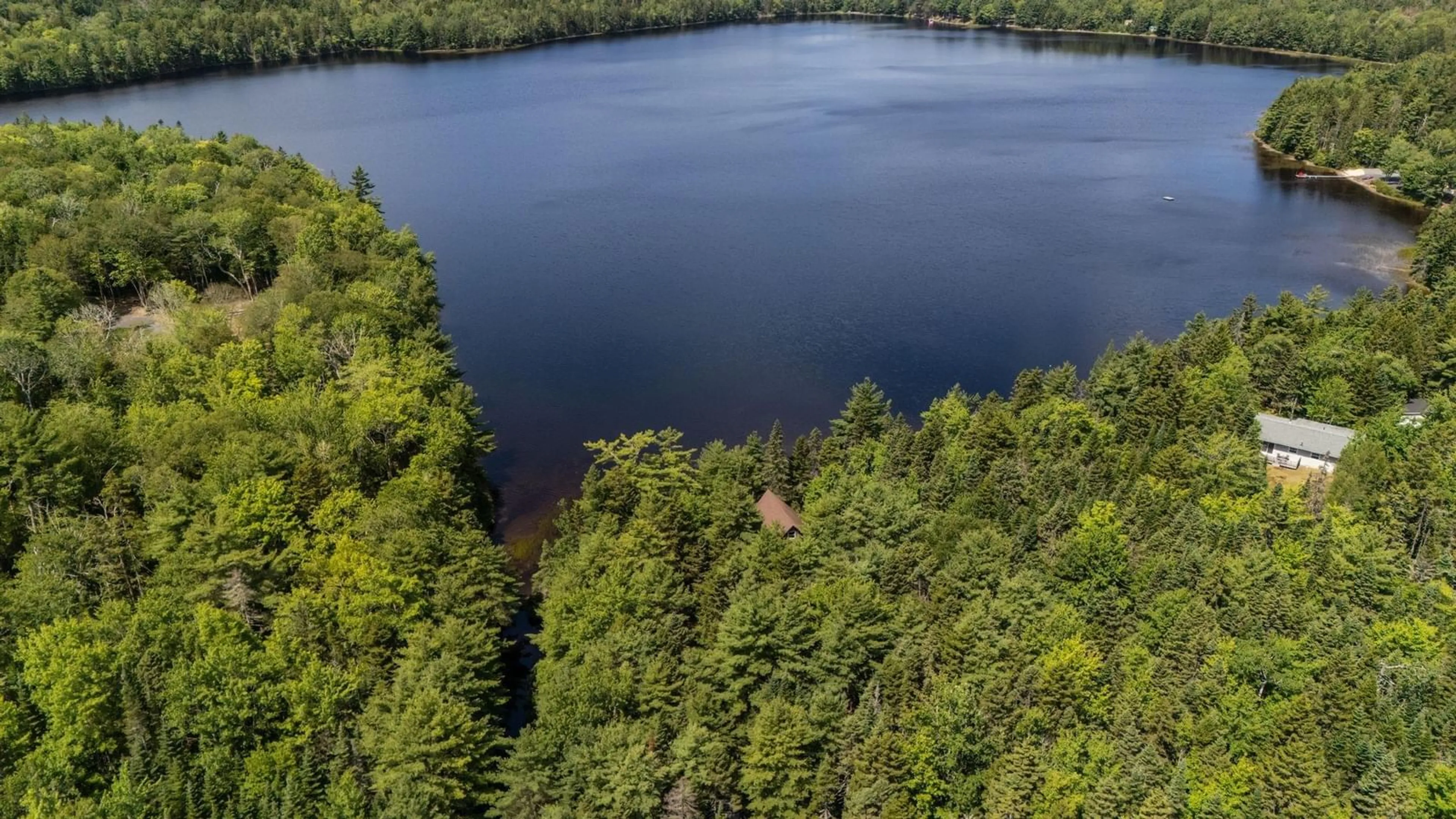 A pic from outside/outdoor area/front of a property/back of a property/a pic from drone, water/lake/river/ocean view for 400 Lakefront Dr, Chelsea Nova Scotia B4V 7M9