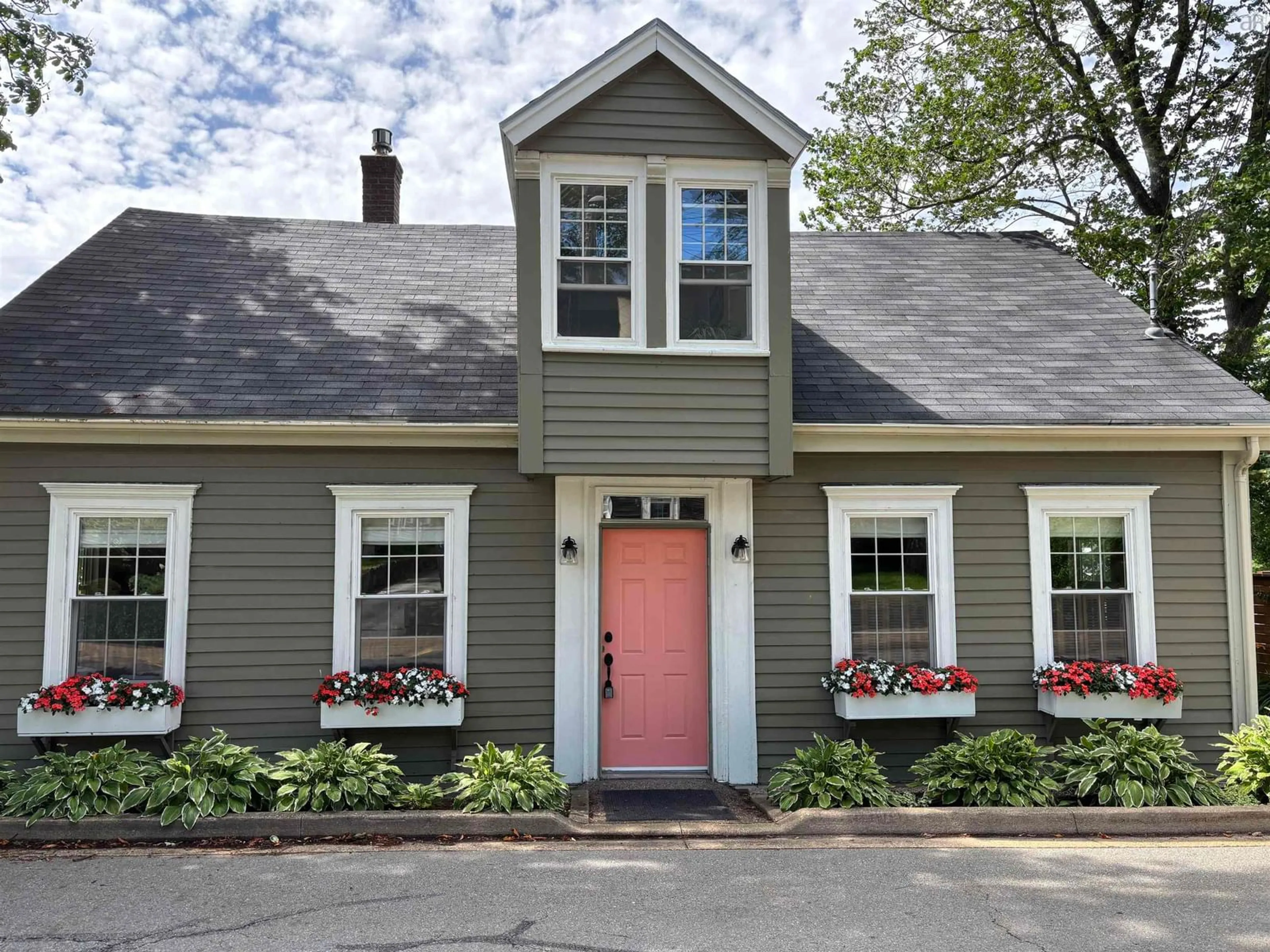 Home with vinyl exterior material, street for 66 Main St, Liverpool Nova Scotia B0T 1K0