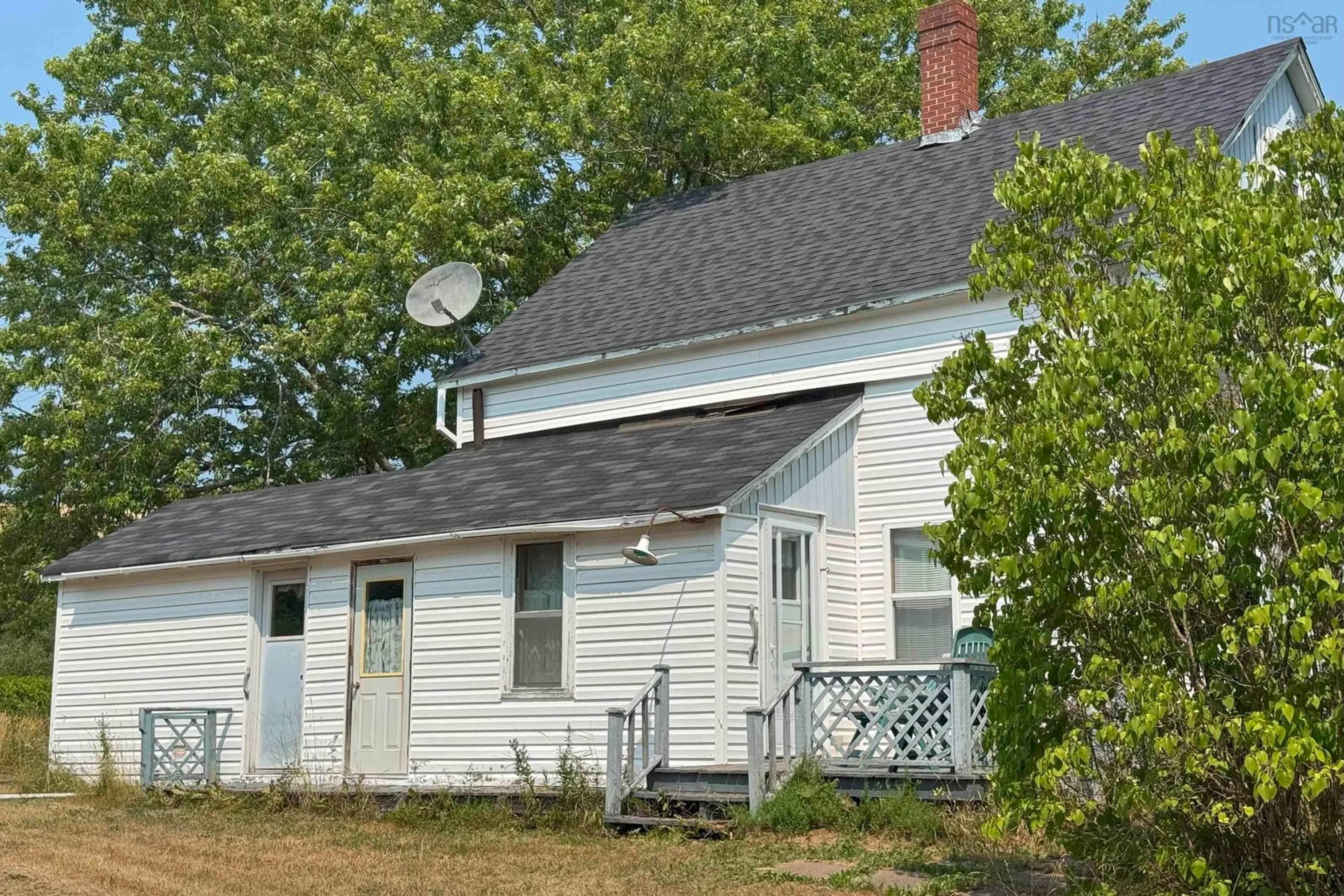Home with vinyl exterior material, street for 10217 Highway 209, Diligent River Nova Scotia B0M 1S0