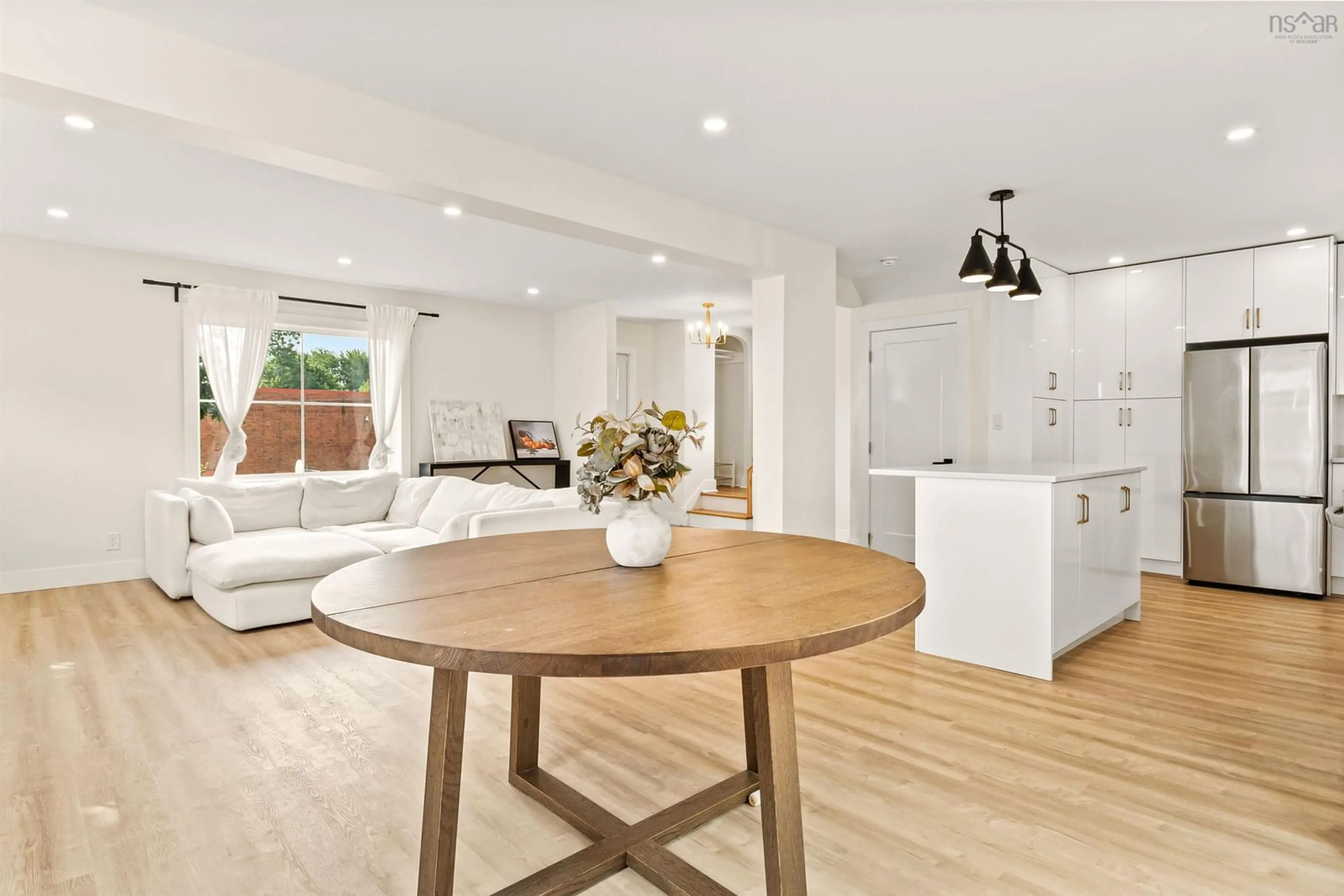 Open concept kitchen, wood/laminate floor for 55 Central Ave, Halifax Nova Scotia B3N 2H5