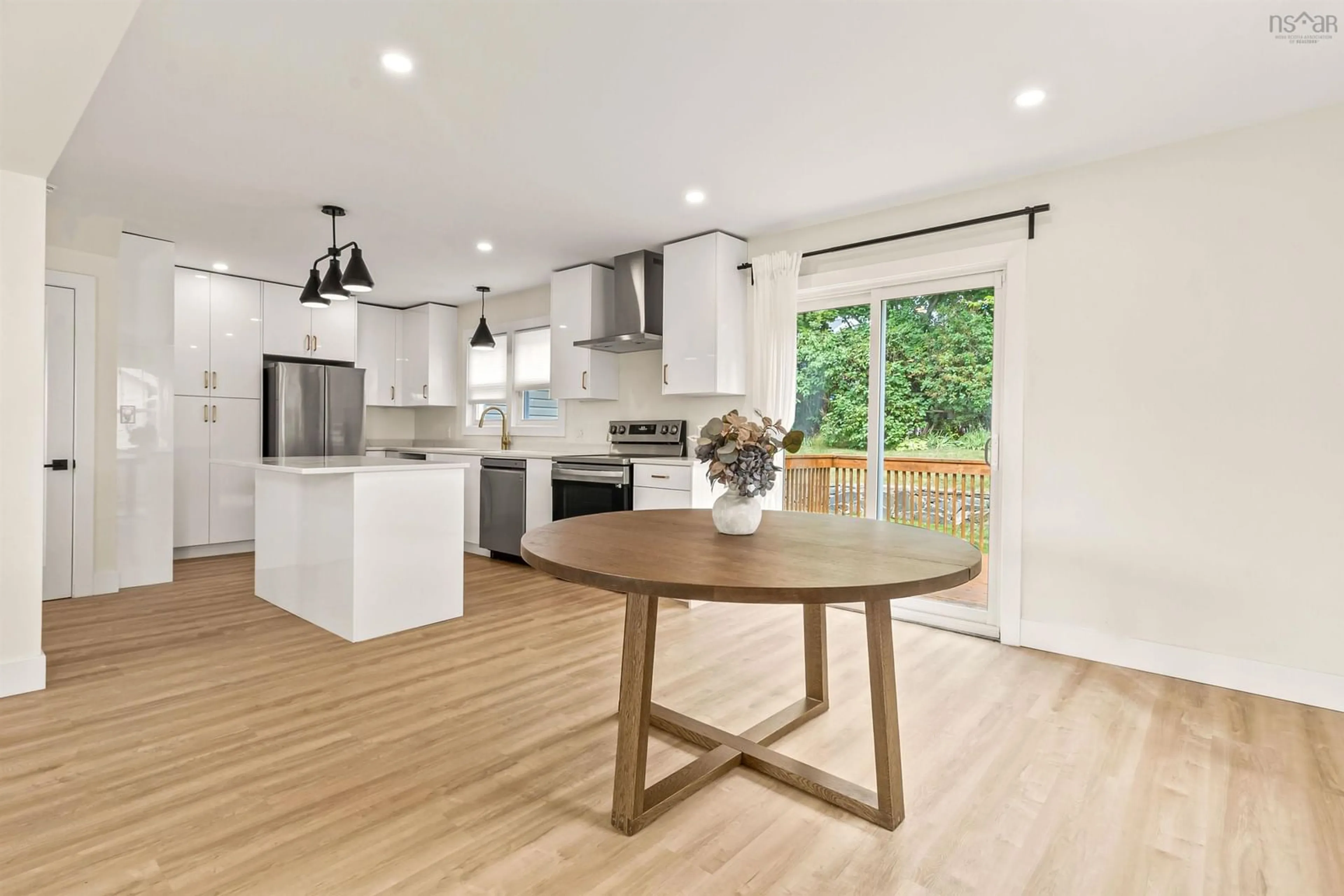 Open concept kitchen, wood/laminate floor for 55 Central Ave, Halifax Nova Scotia B3N 2H5