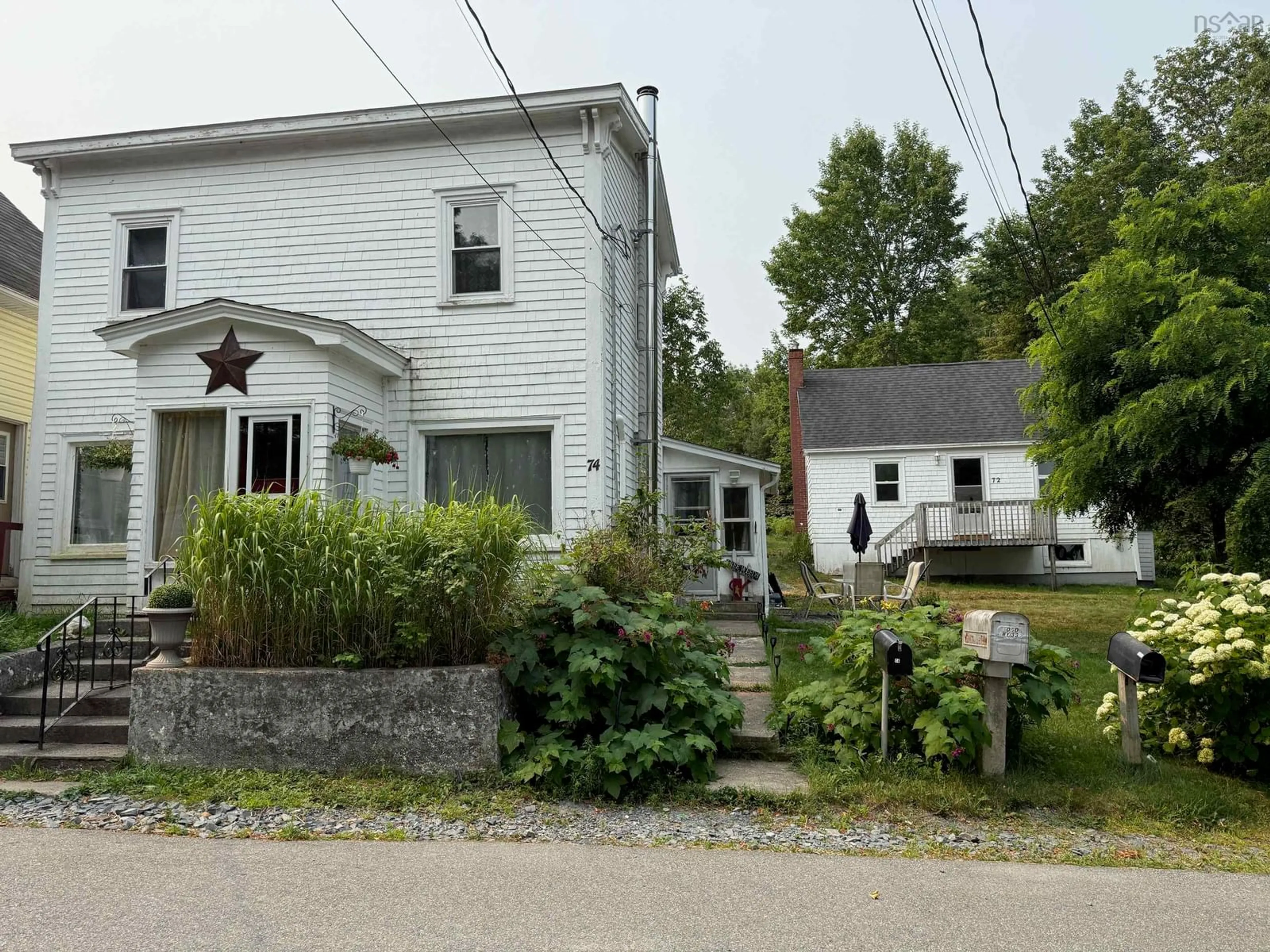 A pic from outside/outdoor area/front of a property/back of a property/a pic from drone, street for 72 Cove Rd, Conquerall Bank Nova Scotia B4V 0T4